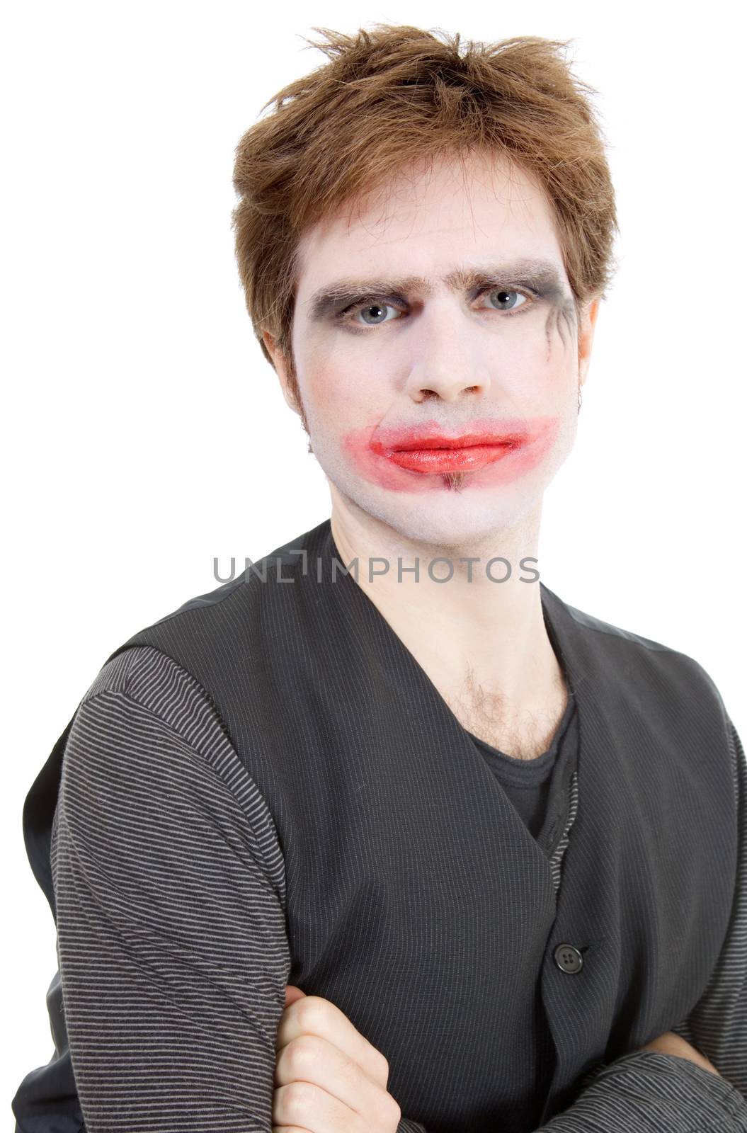 young man dressed as joker, isolated on white