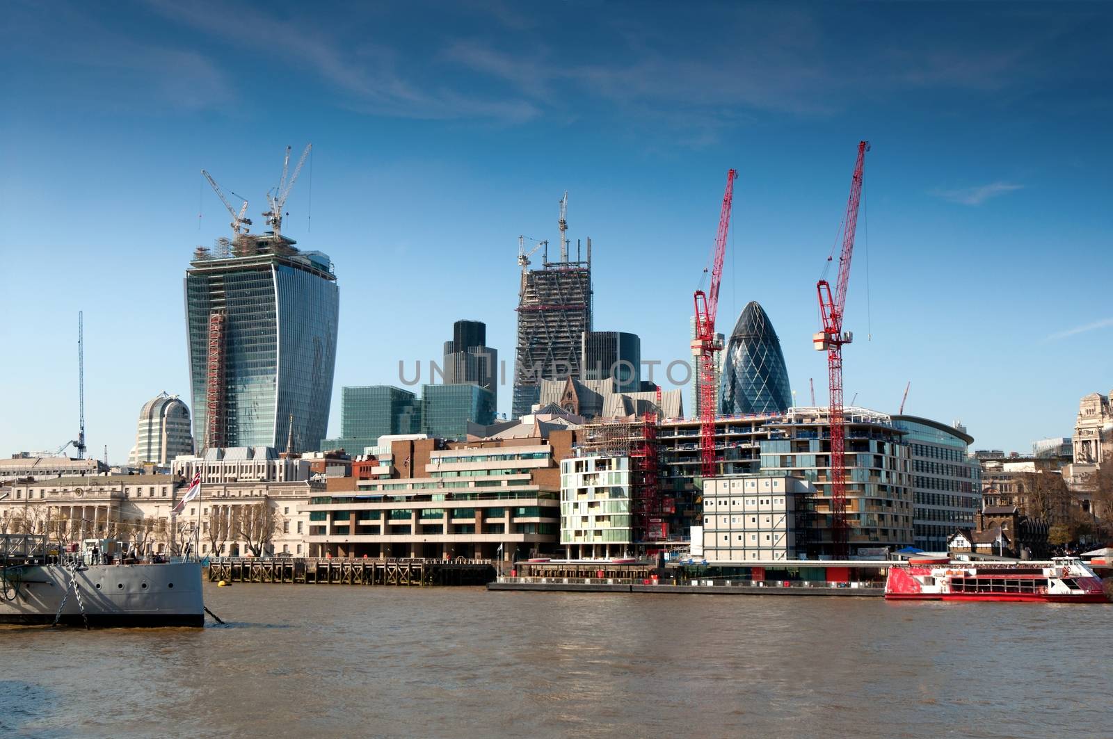 Modern building called Gherkin in London City by mitakag