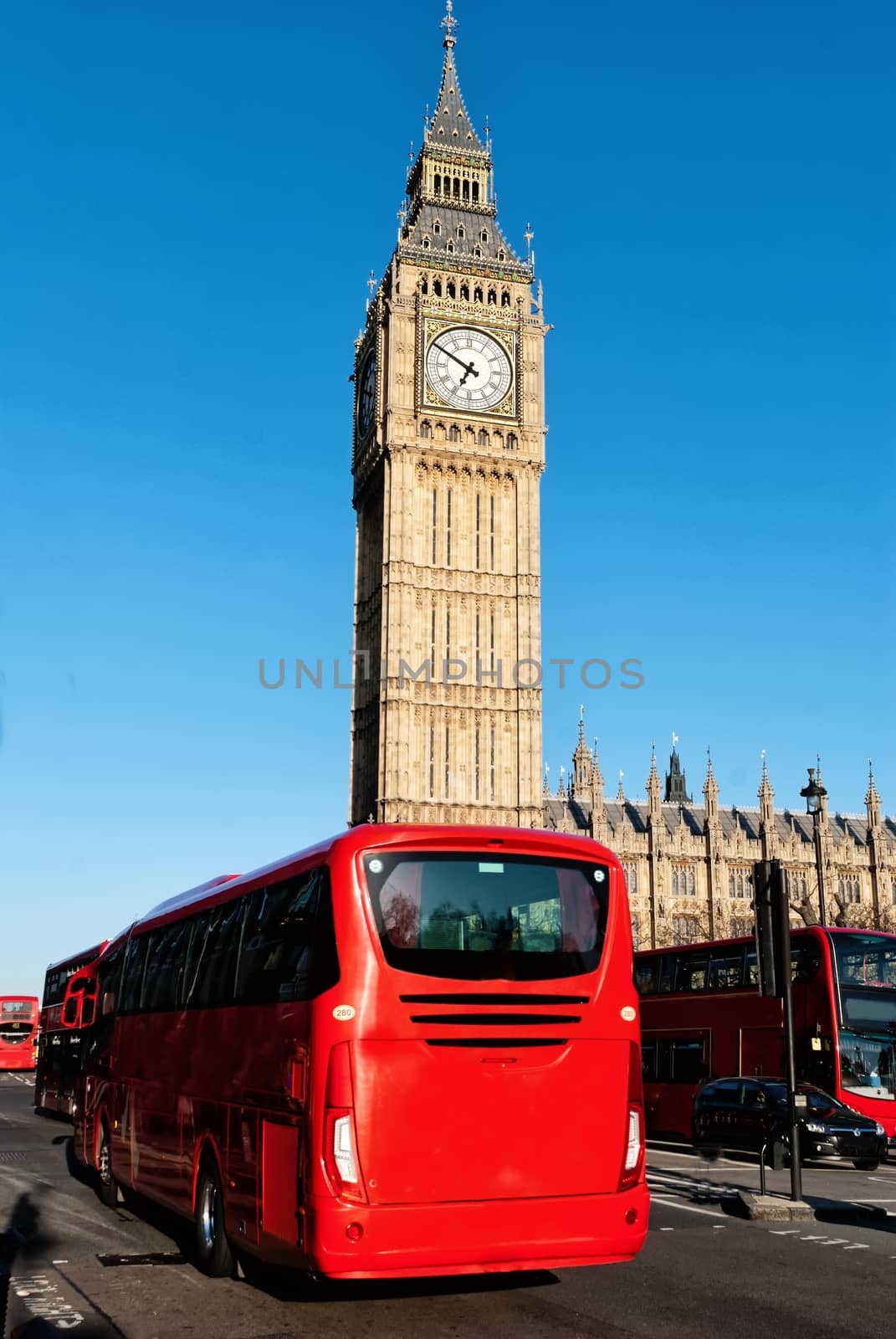 Big Ben and London bus in a sunny day