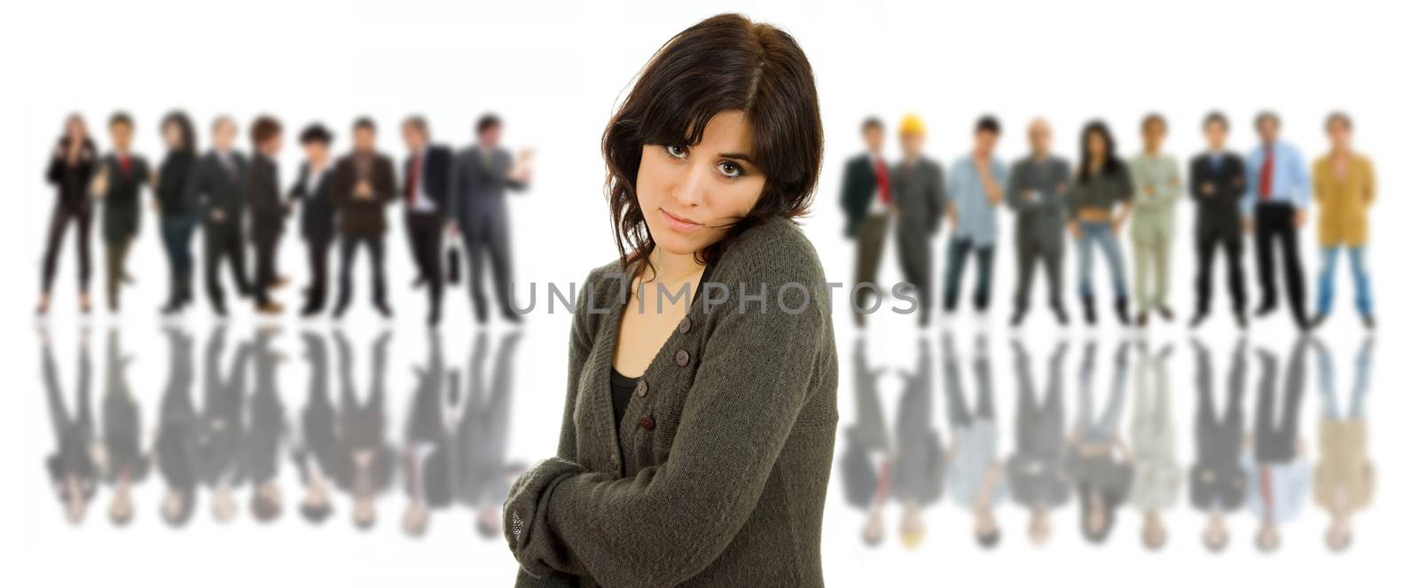young casual woman portrait with some people in the back