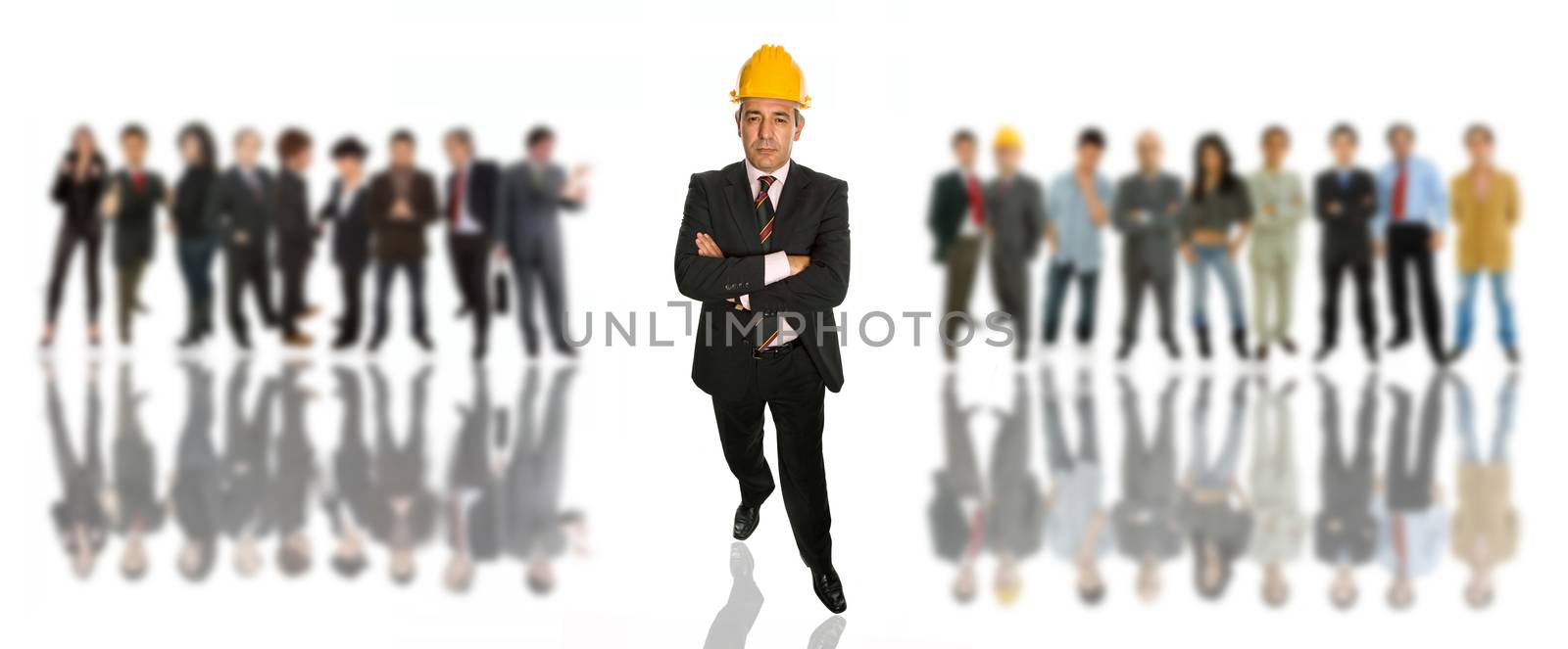 mature business man in front of a group of people
