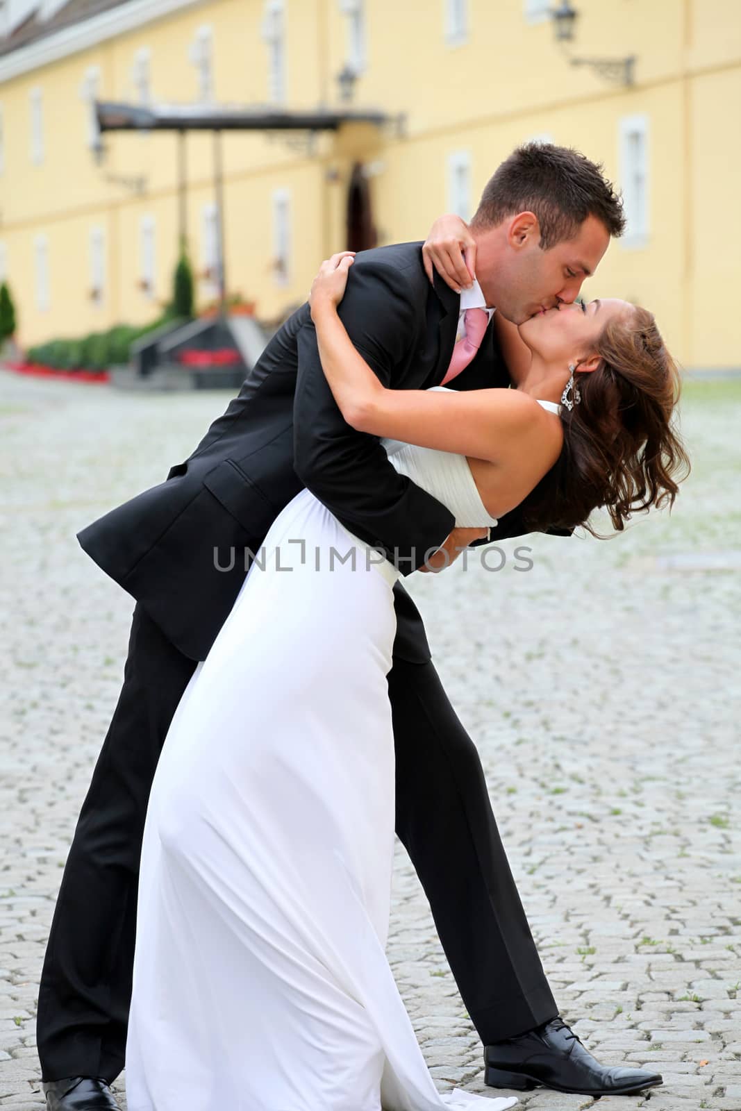 Portrait of a young bride and groom