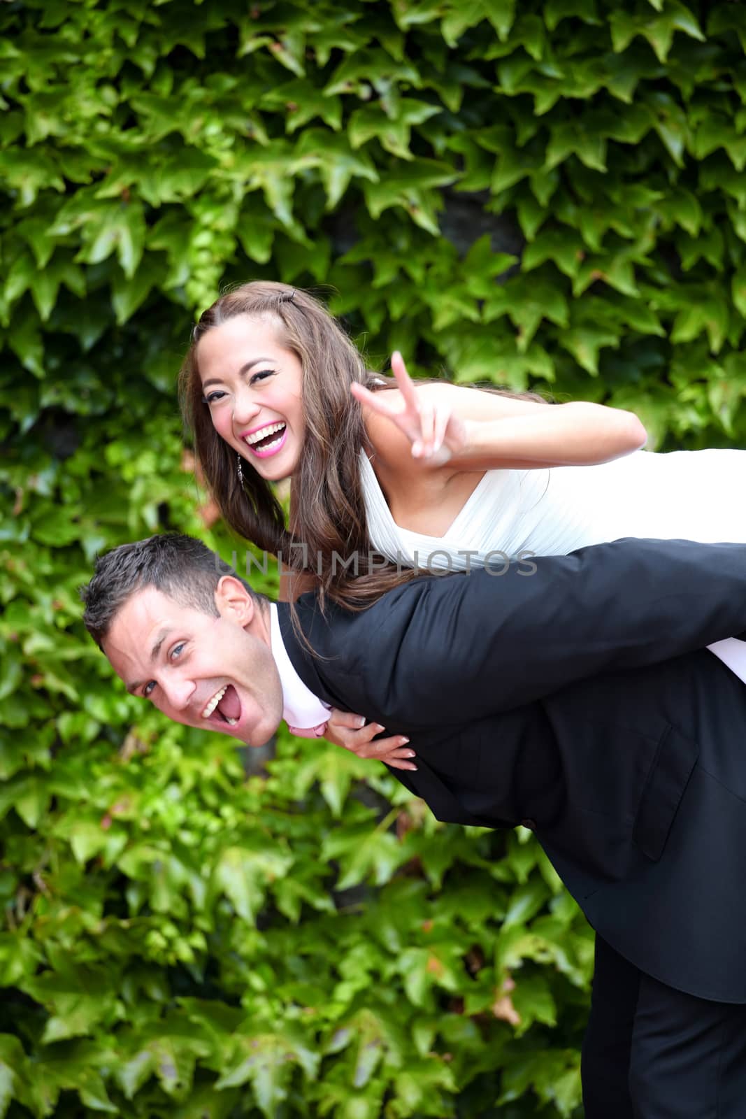 Portrait of a young bride and groom