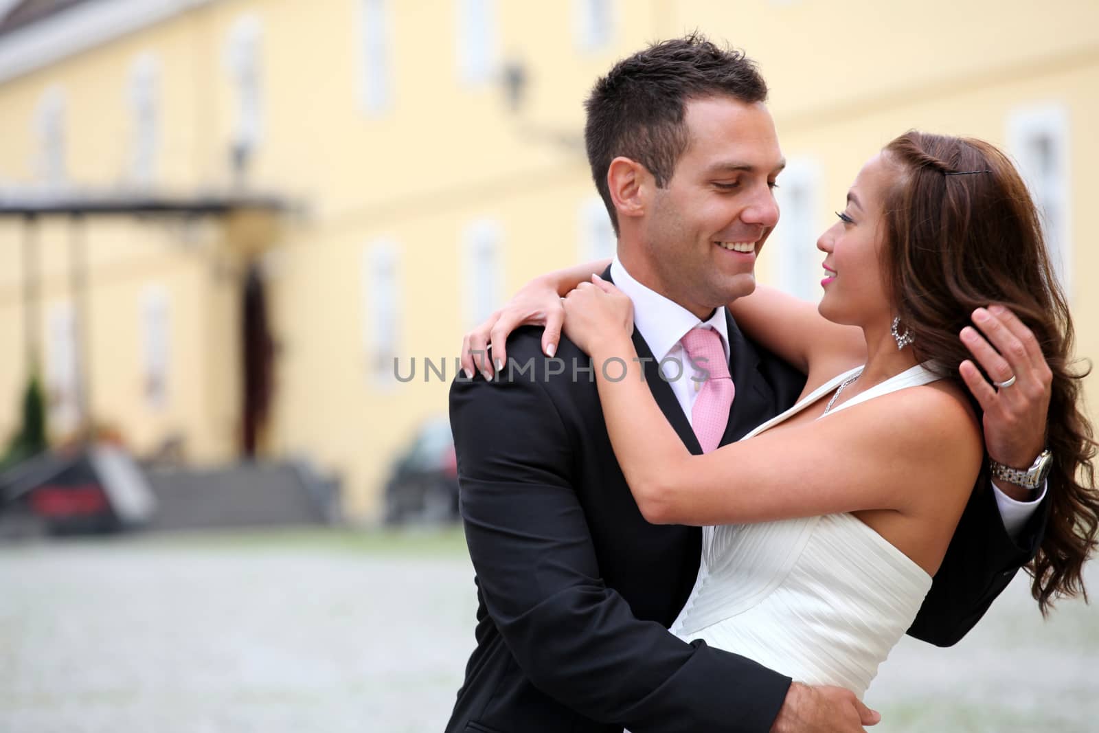 Portrait of a young bride and groom