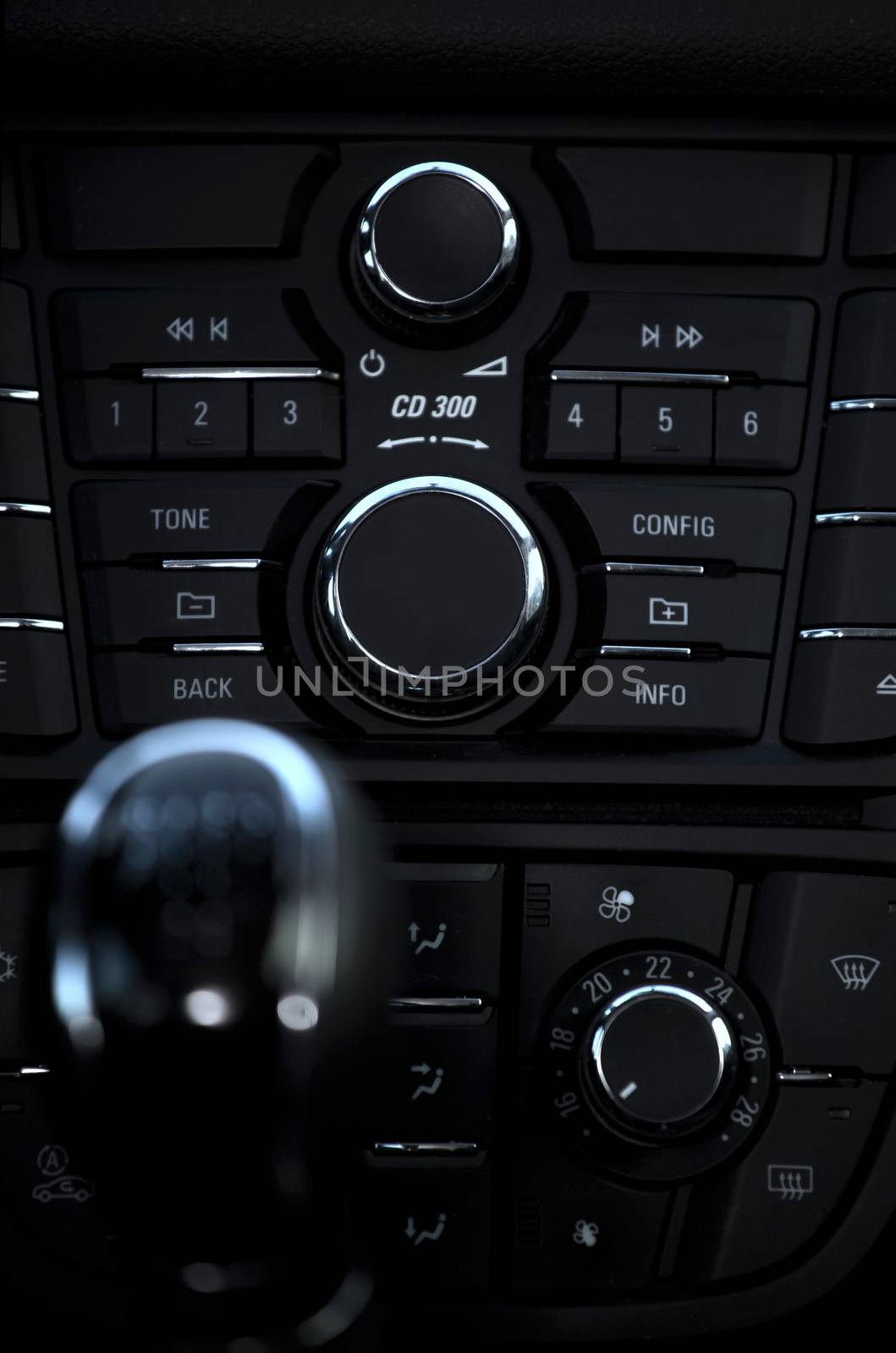 Details closeup of cockpit and dash, gearstick in modern car
