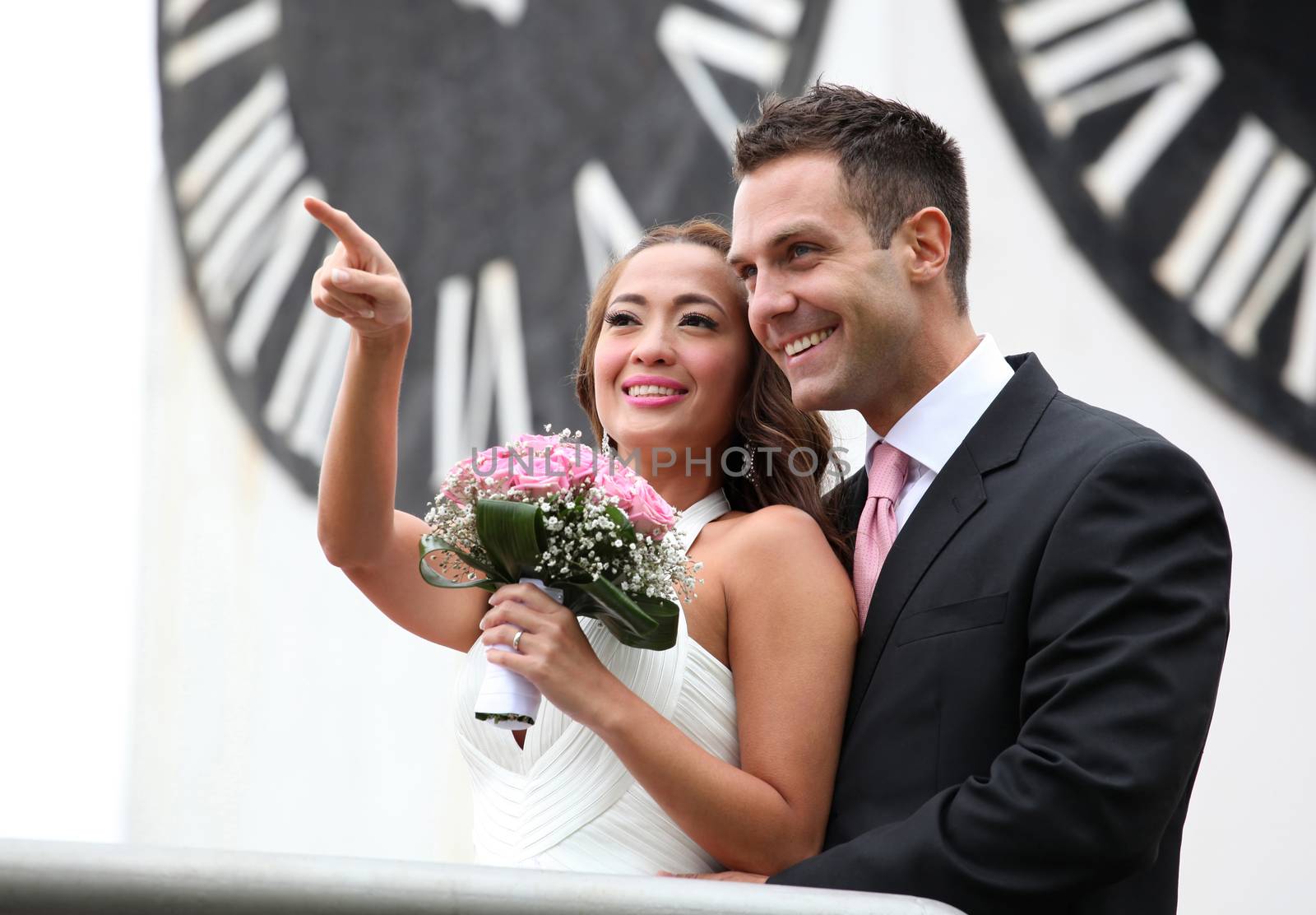 Wedding on the nature, young wedding couple showing