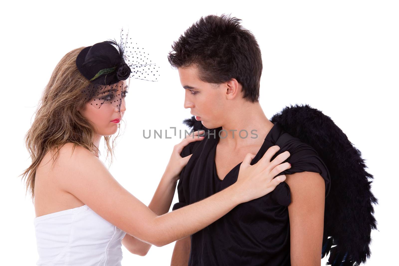 teen couple playing as actors on white background