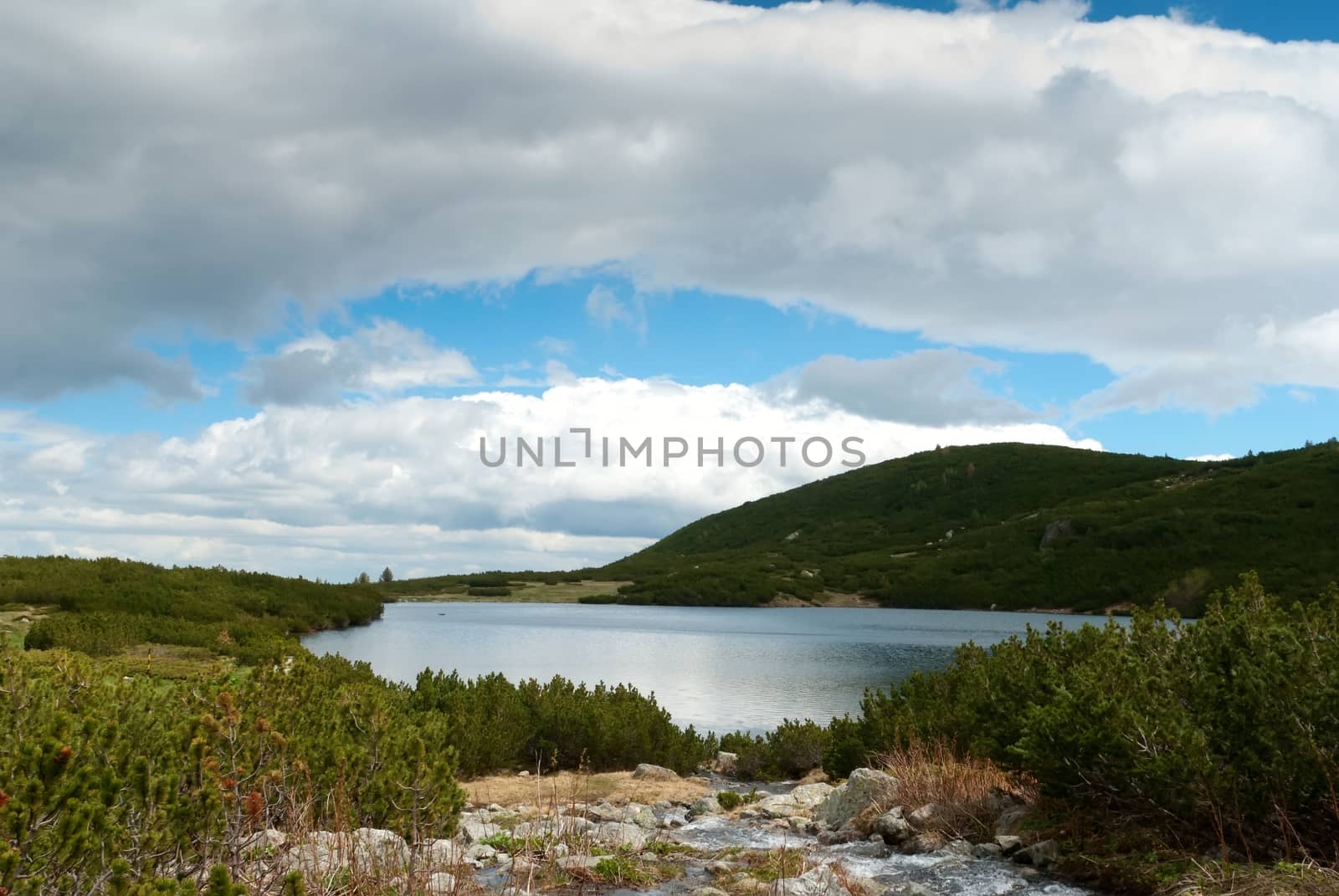 high mountain with lake by mitakag