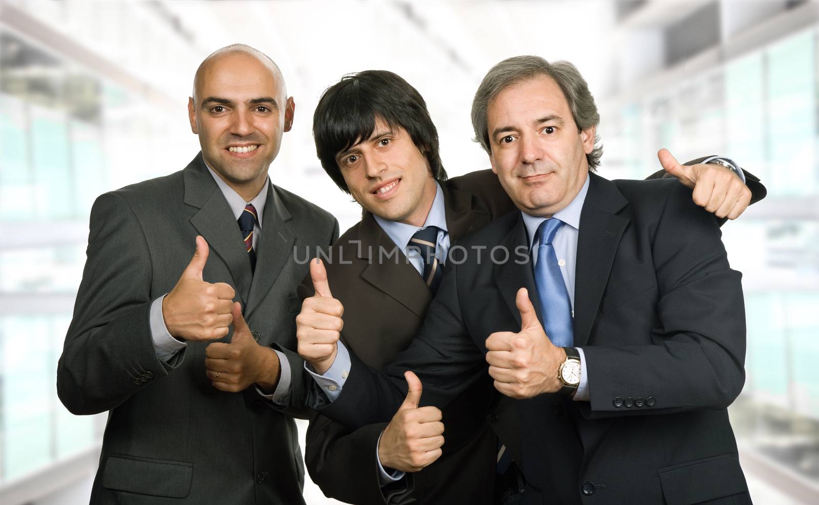 three young business men at the office