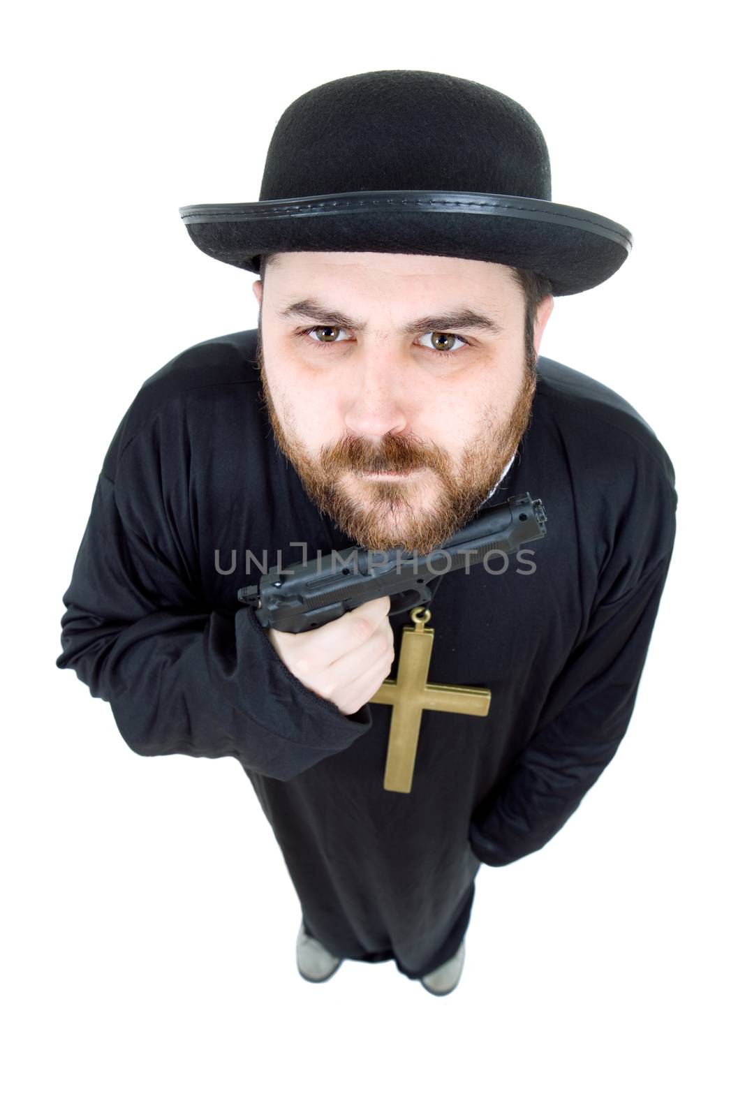 young man dressed as priest with a gun