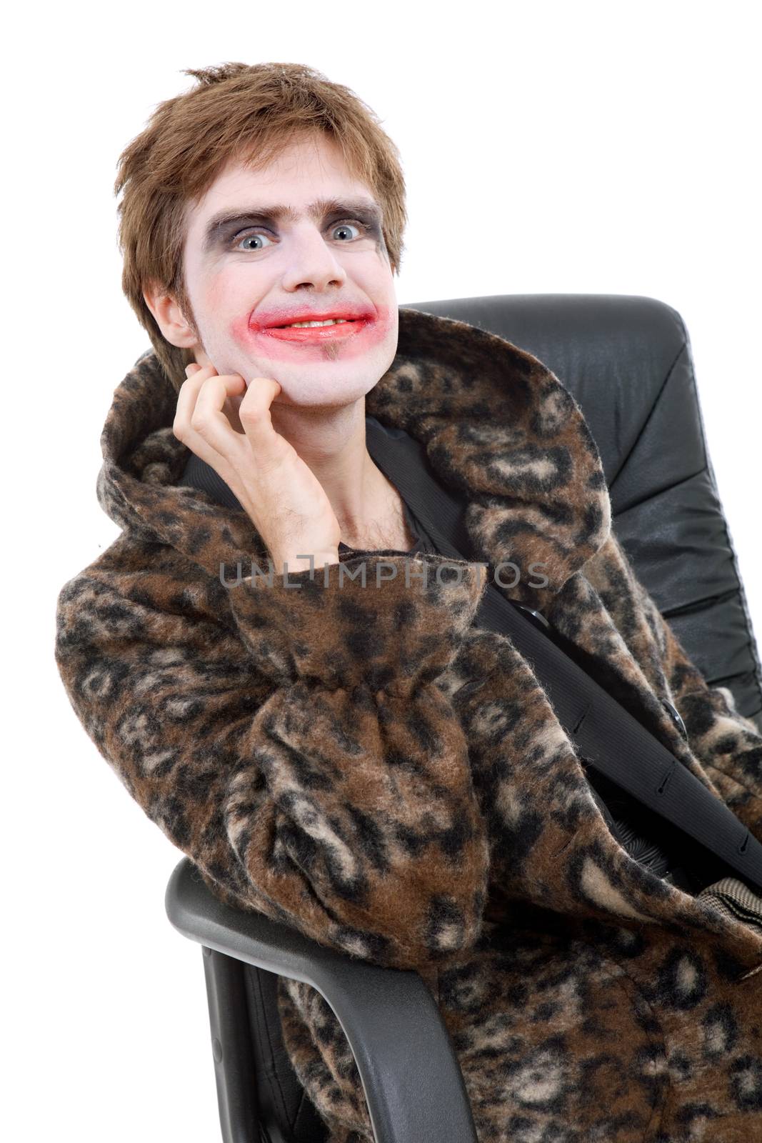 young man dressed as joker, isolated on white