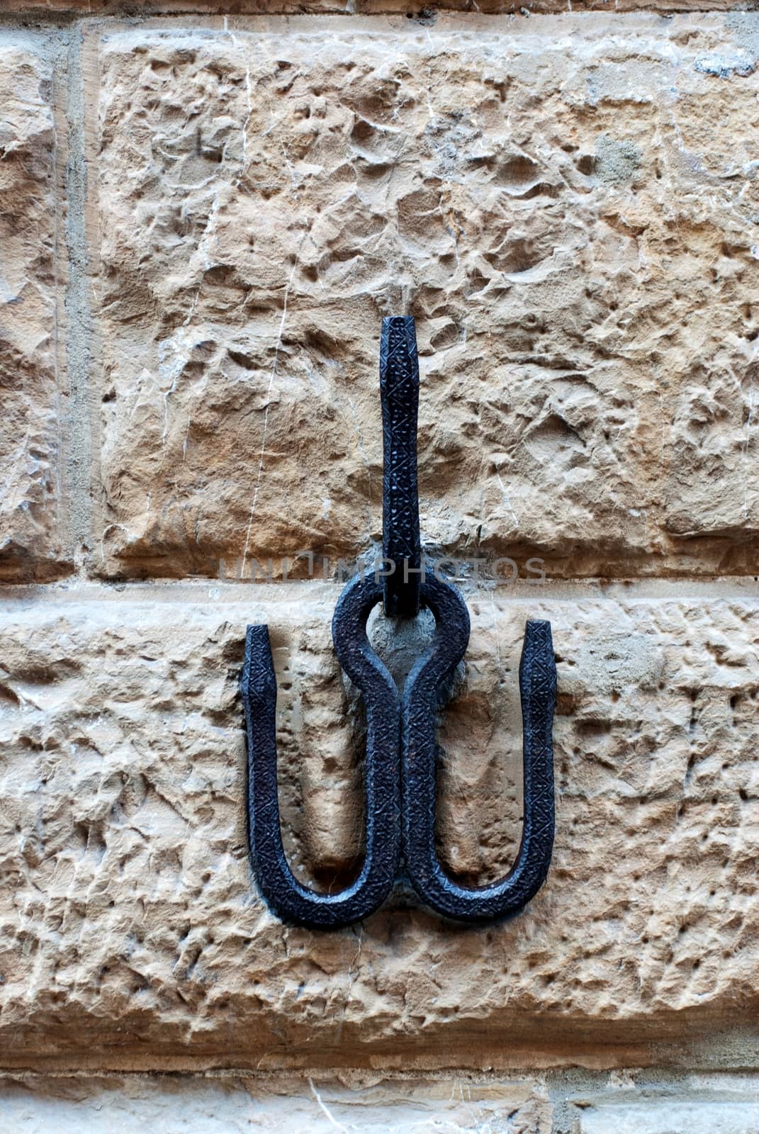 hook on stone wall