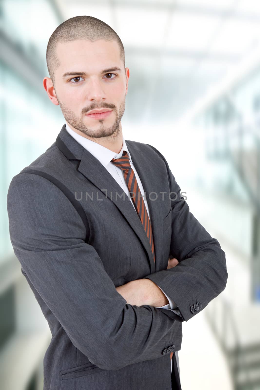 young business man portrait at the office