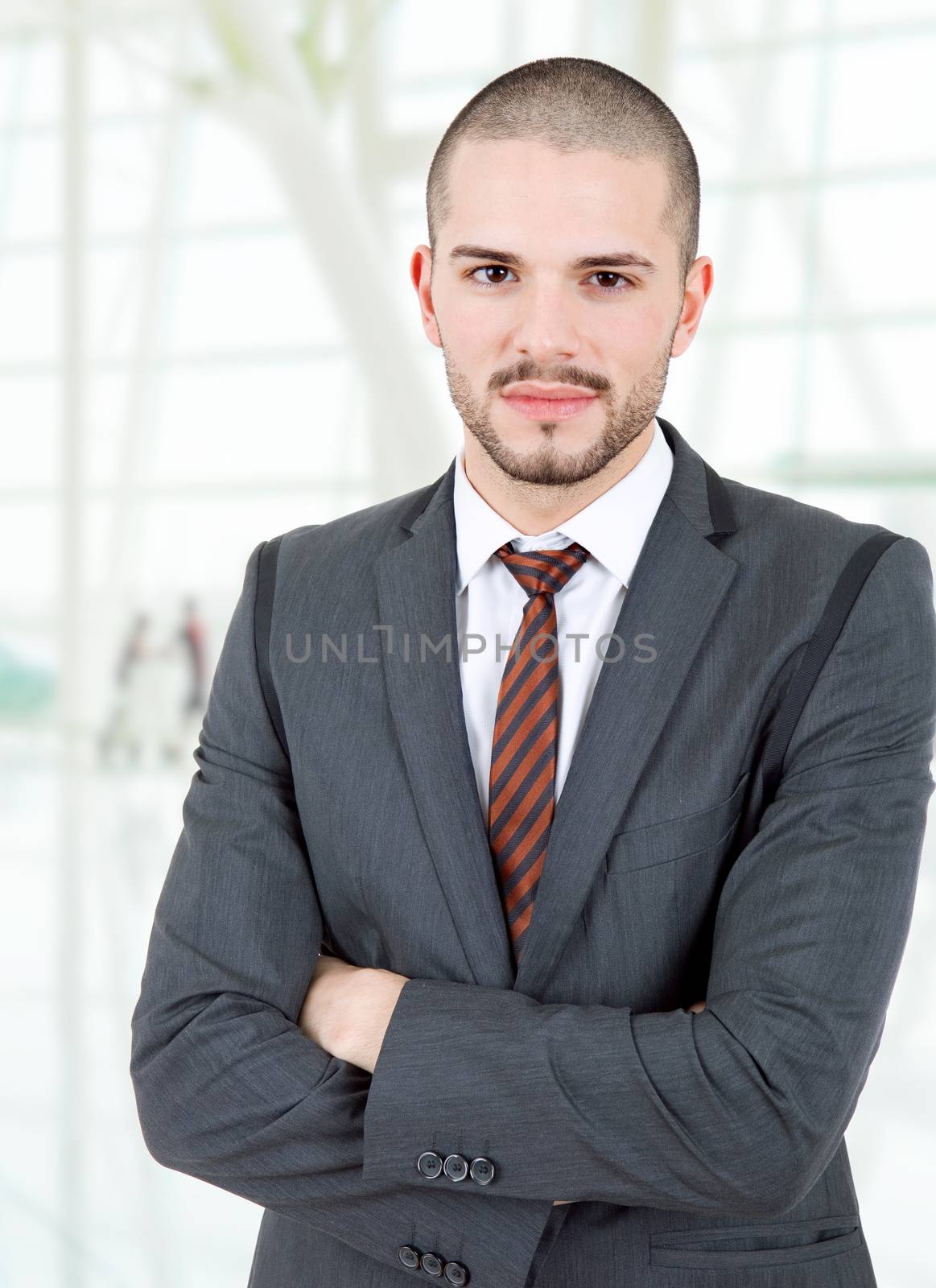 young business man portrait at the office