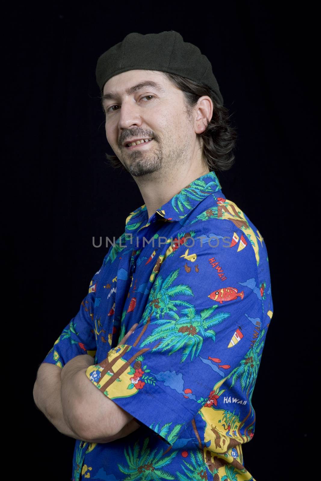 young casual man portrait on a black background