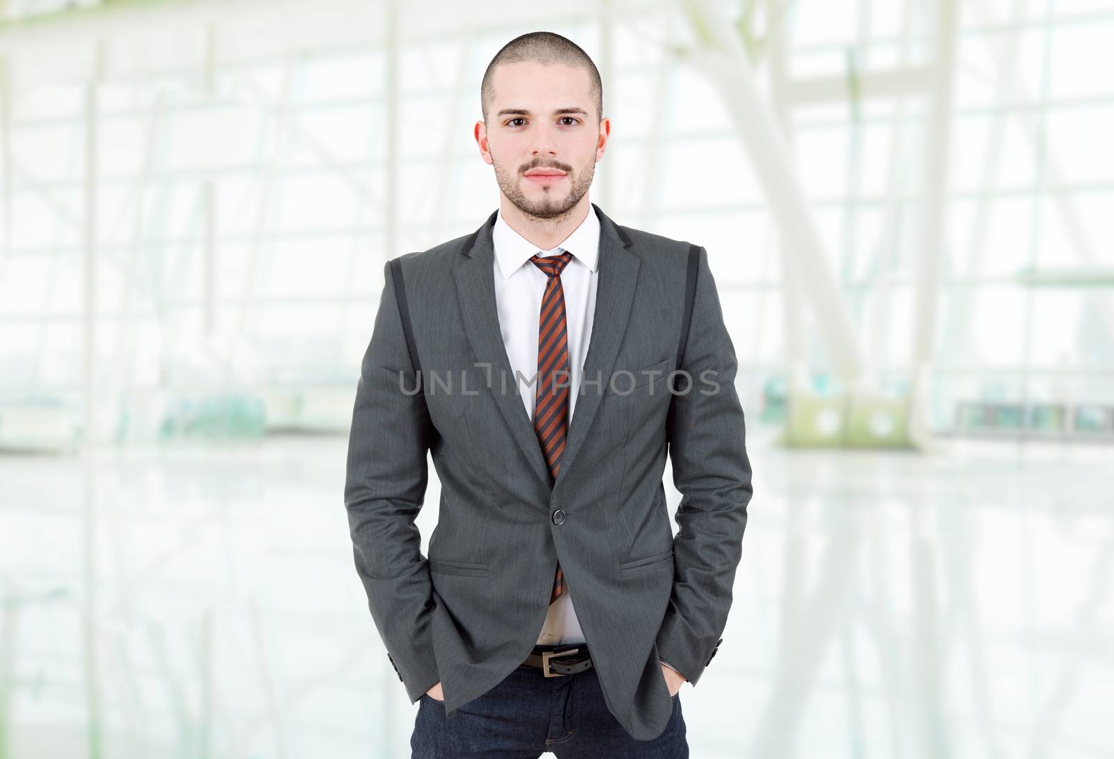 young business man portrait at the office