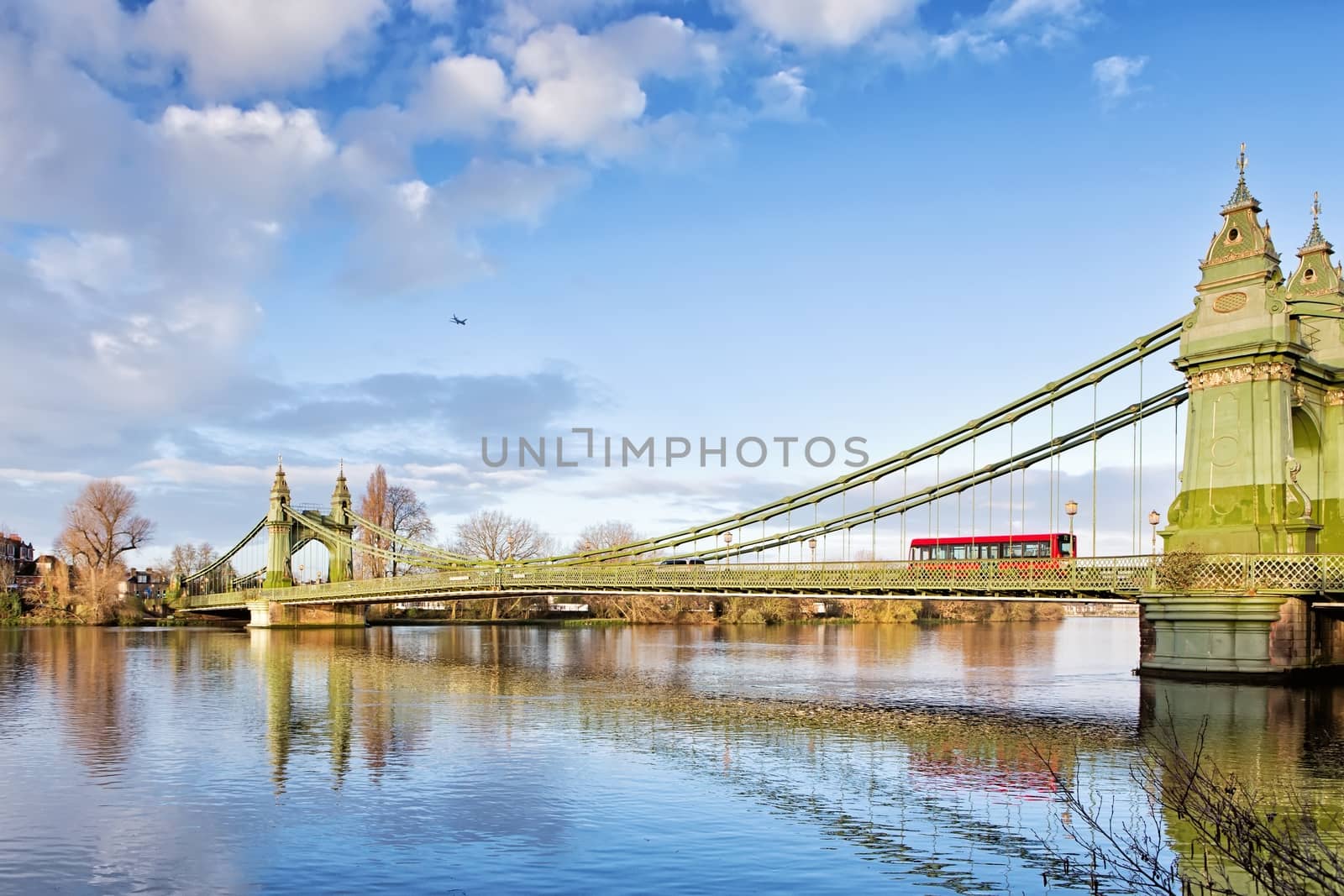 Hammersmith Bridge and south riverside of Thames, London, UK
