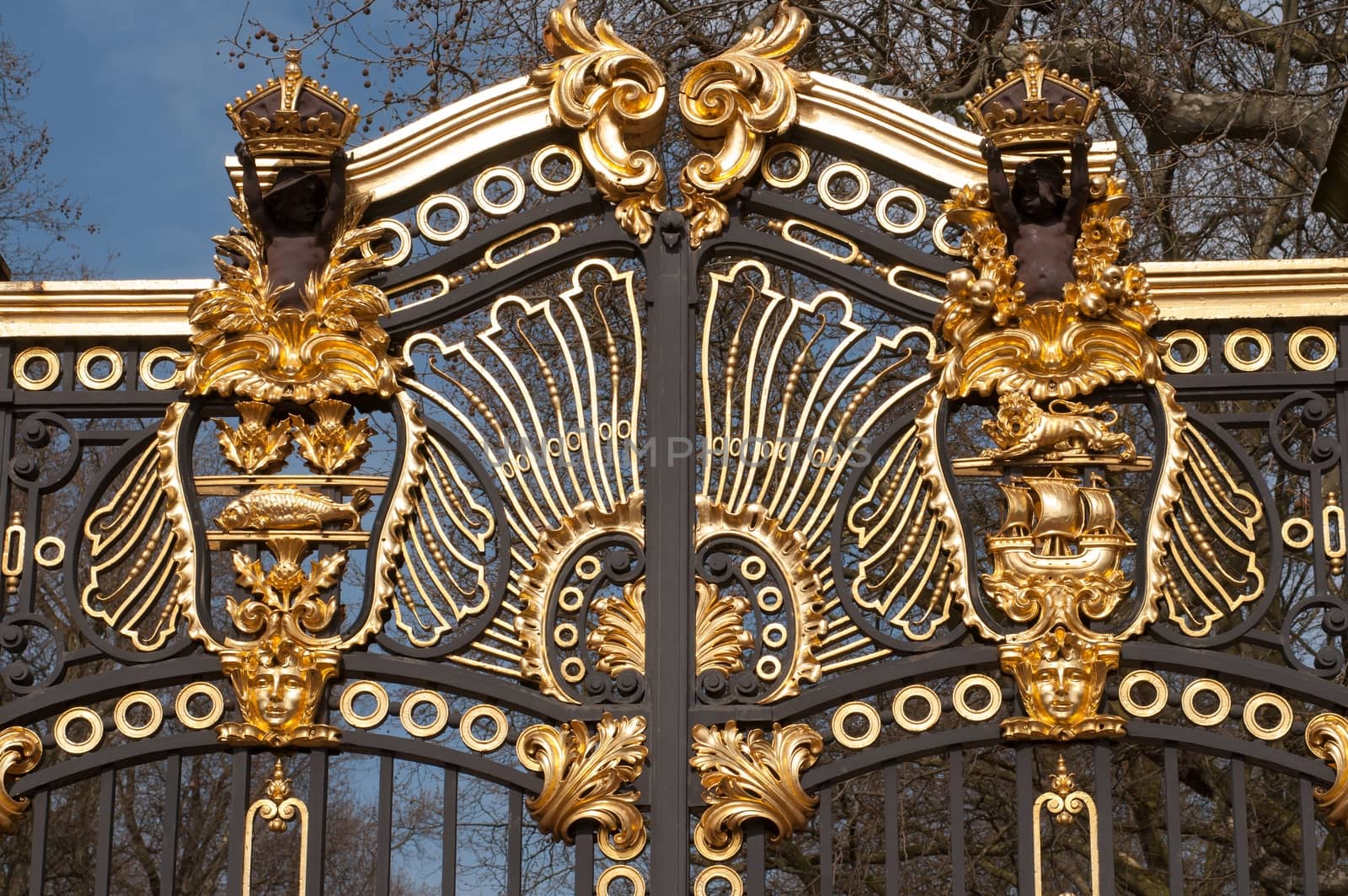 Retro metal gate with decorative ornaments close view