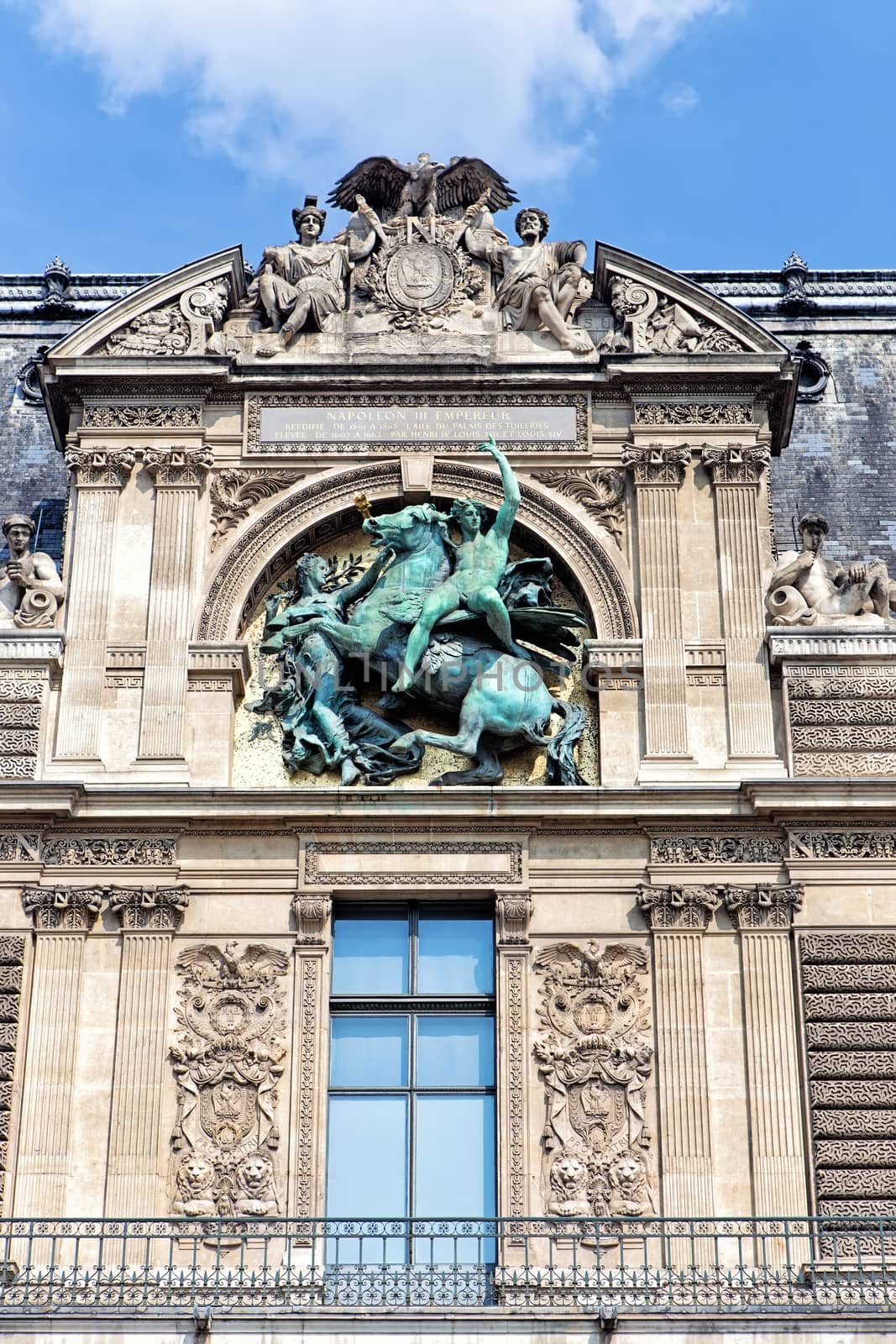 Detail from the facade of the Louvre Museum (Musee du Louvre) in Paris, France by mitakag