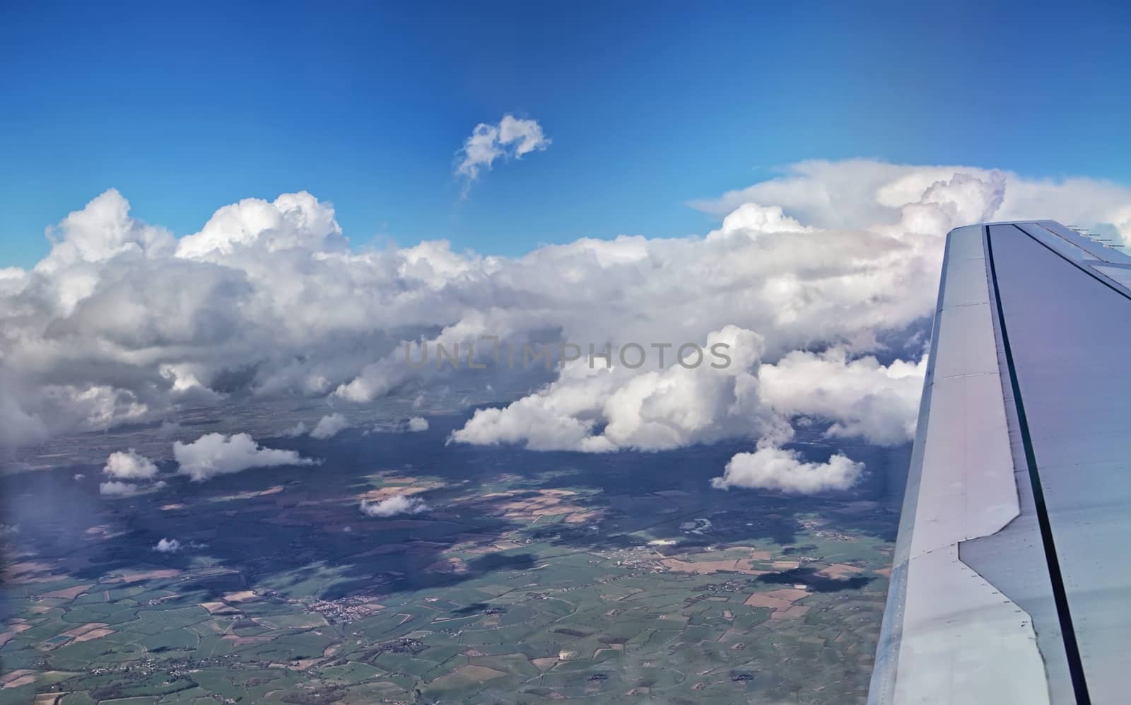 View out of airplane Airplane wing in flight by mitakag