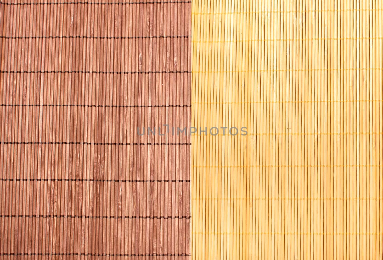 Bamboo brown straw mat as abstract texture background composition by mitakag