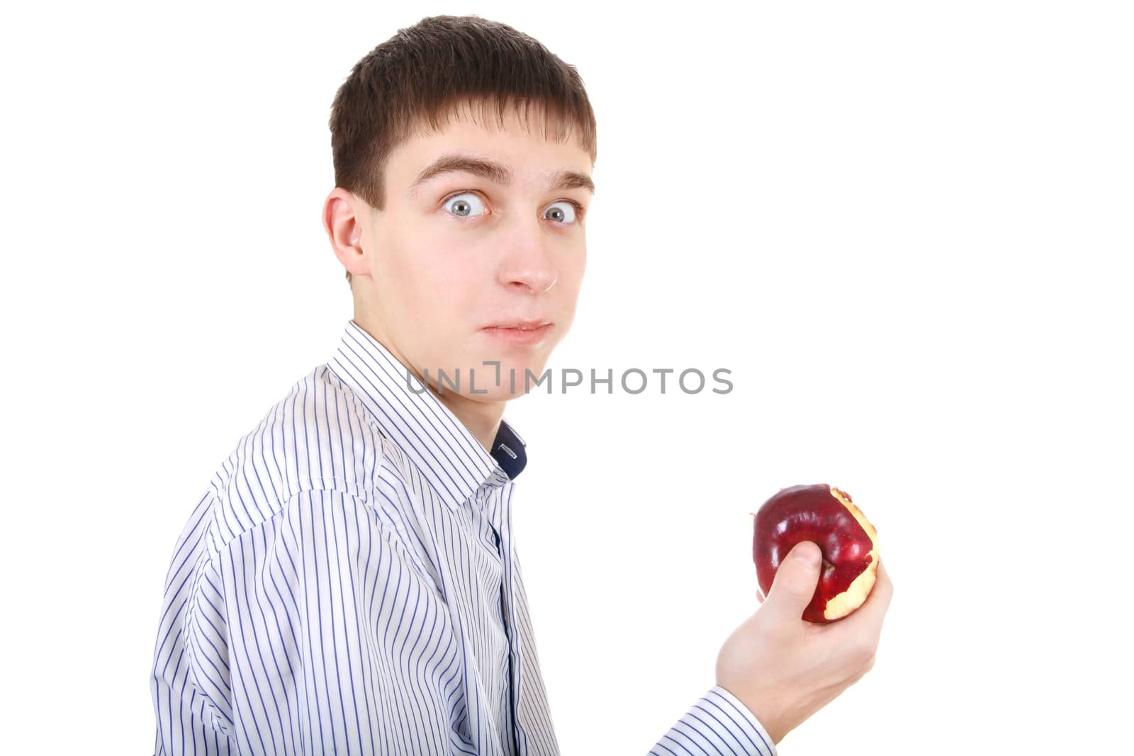 Surprised Teenager with an Apple Isolated on the White Background