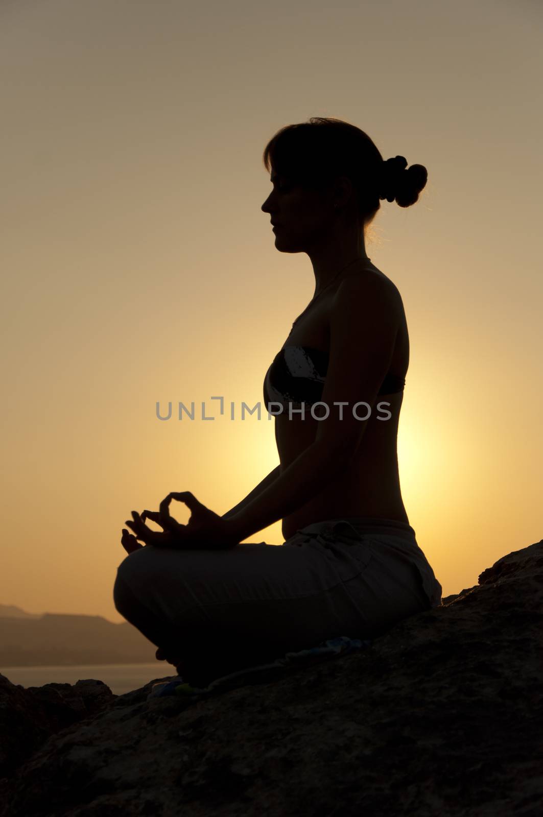 Seaside yoga poses at sunrise by dred