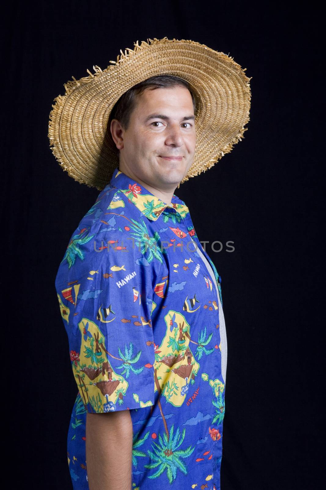 young casual man portrait on a black background