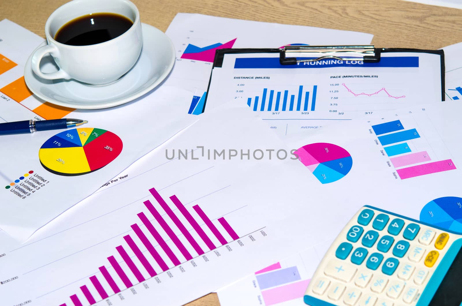 Business documents and keyboard placed on desks.