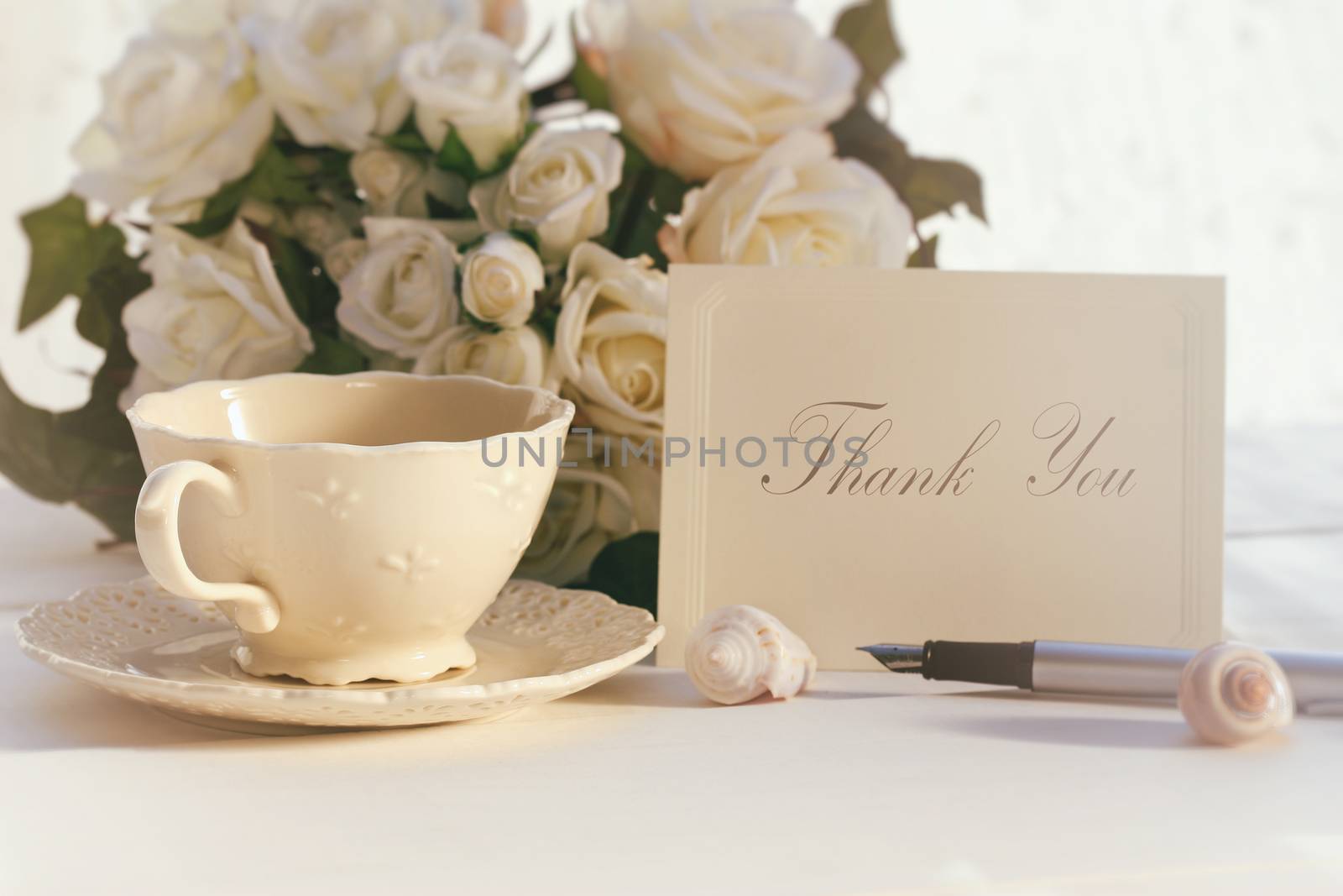 Thank you note with tea cup and roses
