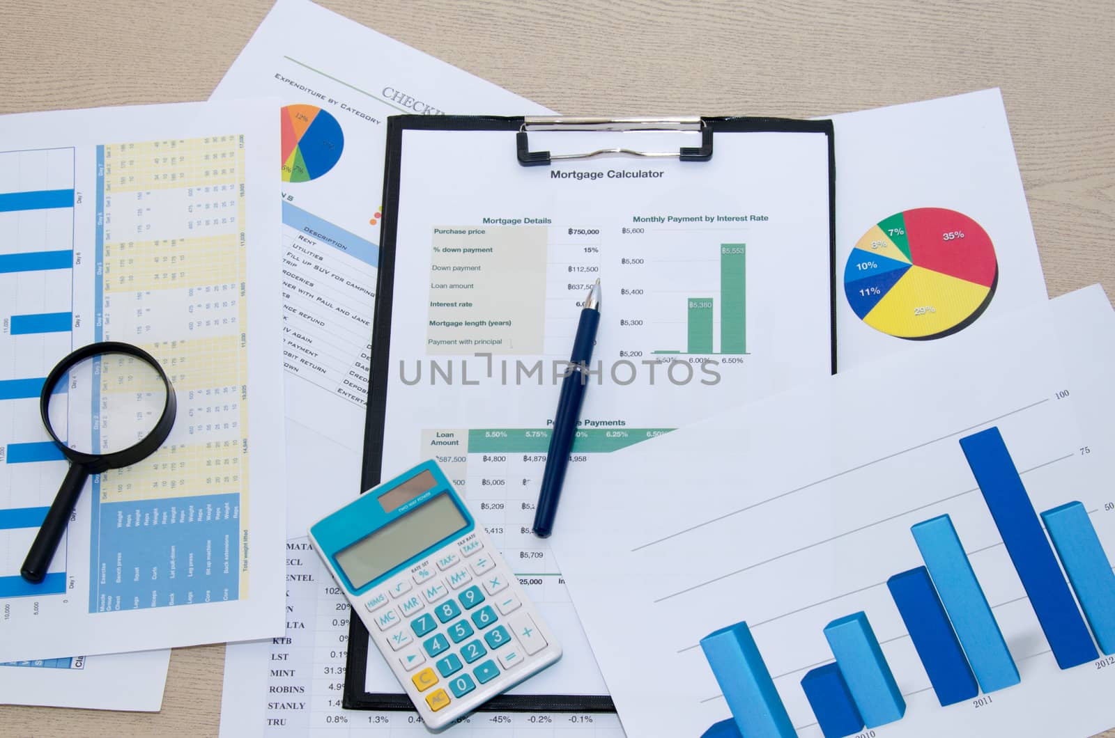 Business documents and keyboard placed on desks.