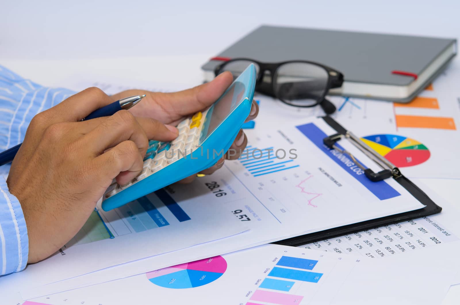 Business documents and keyboard placed on desks.