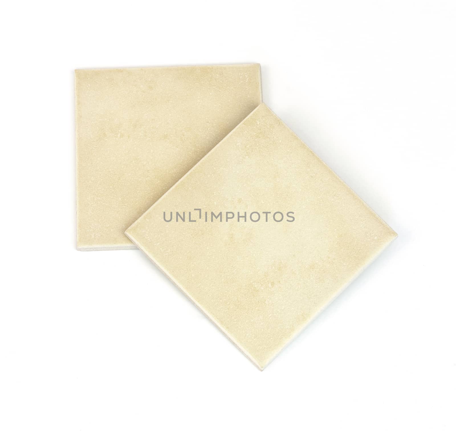 Two ceramic tiles. Isolated on white background