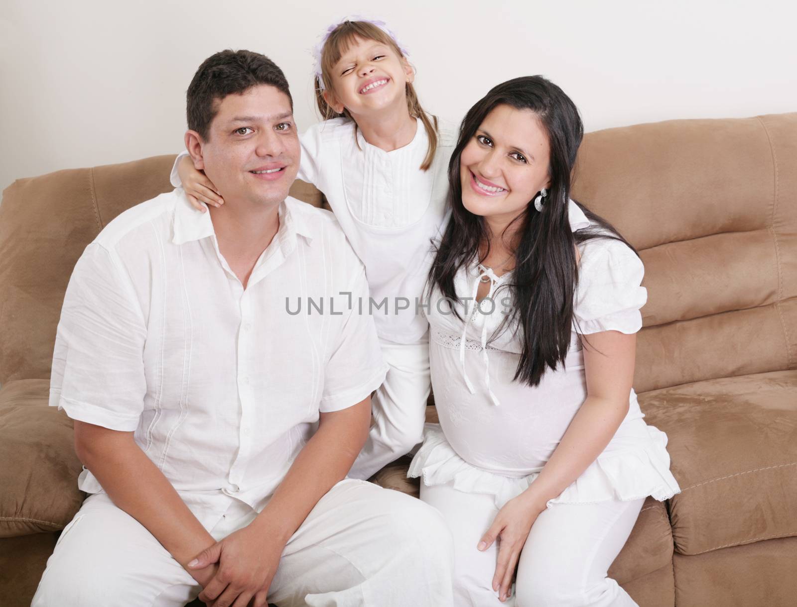 Portrait of a happy hispanic family by dacasdo