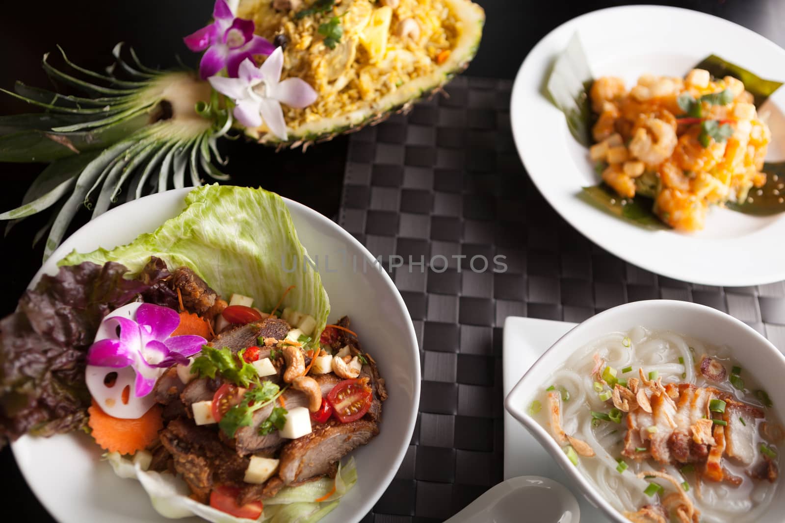 A variety of Thai food dishes on a table.