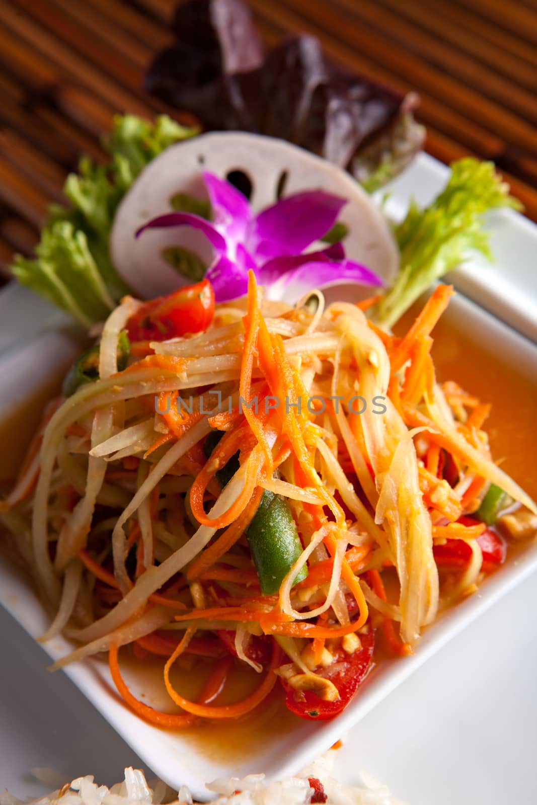 Traditional dish of freshly prepared Thai food.  Som tum green papaya salad.