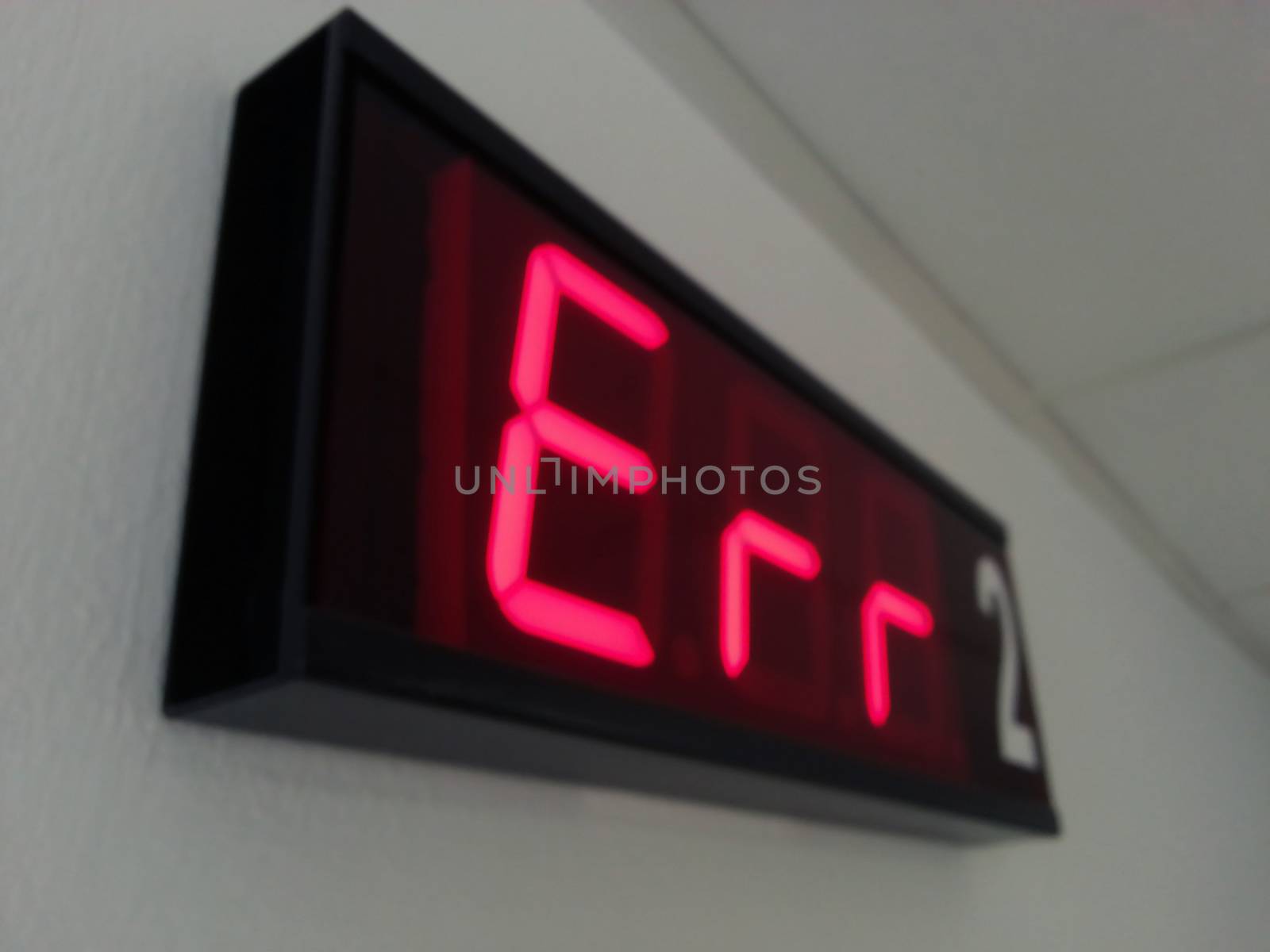 Digital room display in hospital at night, macro shot.