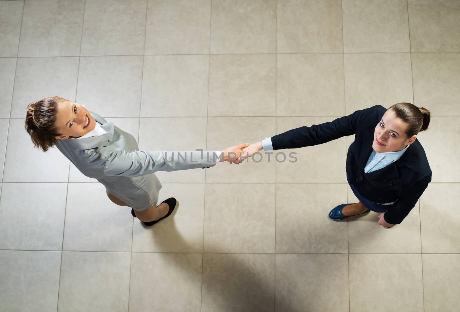 image of a business woman shaking hands, business meeting