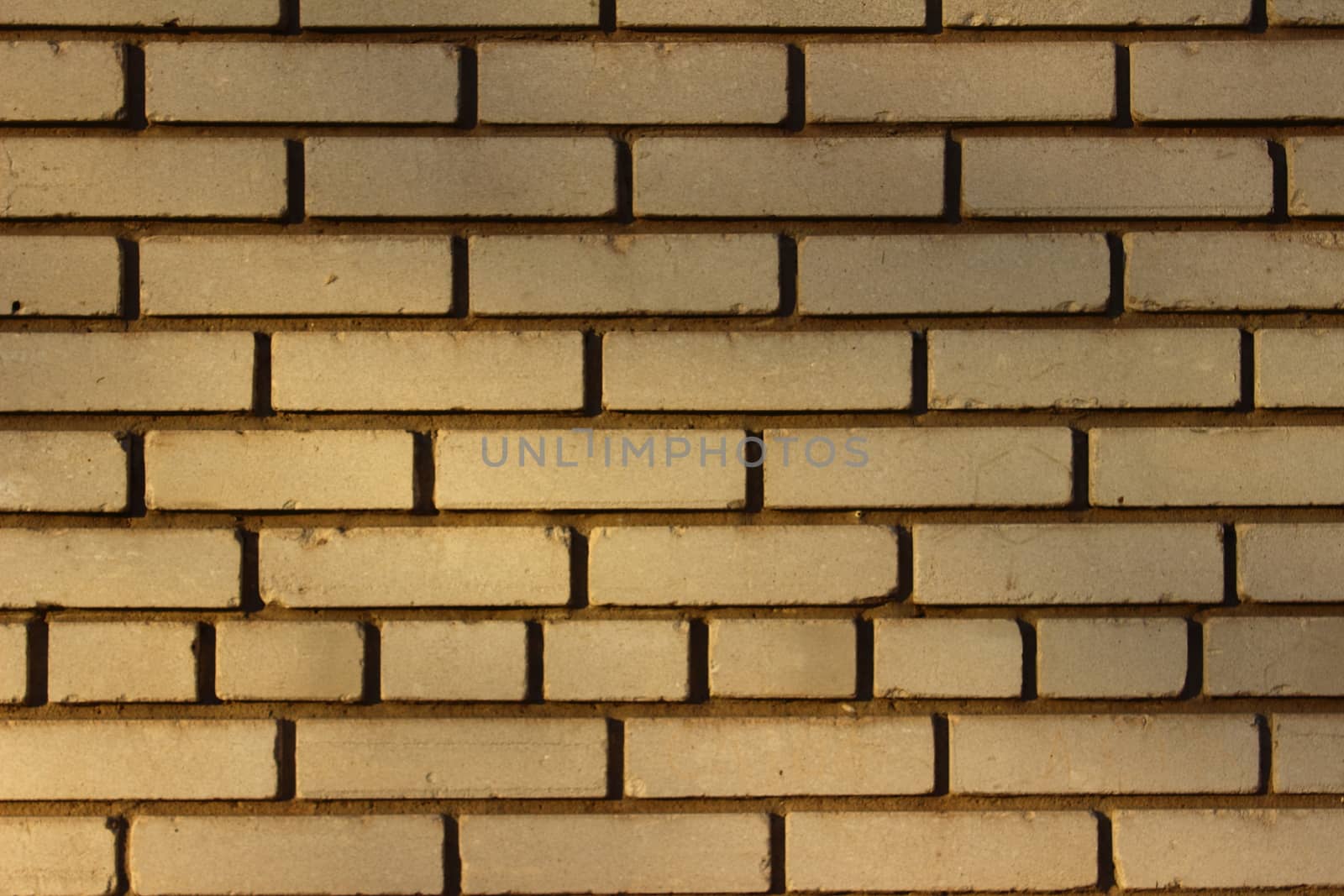 White wall of smooth rectangular silicate brick