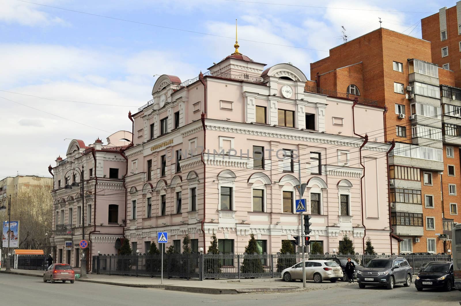 One of numerous architectural sights of Tyumen is V. I. Rabinovich's built in 1911 - 1922 the House.  The mansion represents very recognizable and characteristic example of stone Tyumen architecture of the beginning of the XX century.  The author of the project is the city architect Konstantin Pavlovich Chakin.  It enriched composition of a construction habitual for the city with fine furniture of the facades executed in style the neorenaissance. 

On the first floor of the stone house the shop of Rabinovich and To Association was placed. Here the women's and men's wear, caps, furs and road things was on sale. The mansion was the main building of the estate which warehouses and two wooden two-storeyed houses also entered. Except V. I. Rabinovich, lodgers lived in the house. In 1918 the estate nationalized. Since 1936 the creamery, and then � dining rooms here settled down. At the end of the XX century the building reconstructed according to the project G. M. Dubonosa.