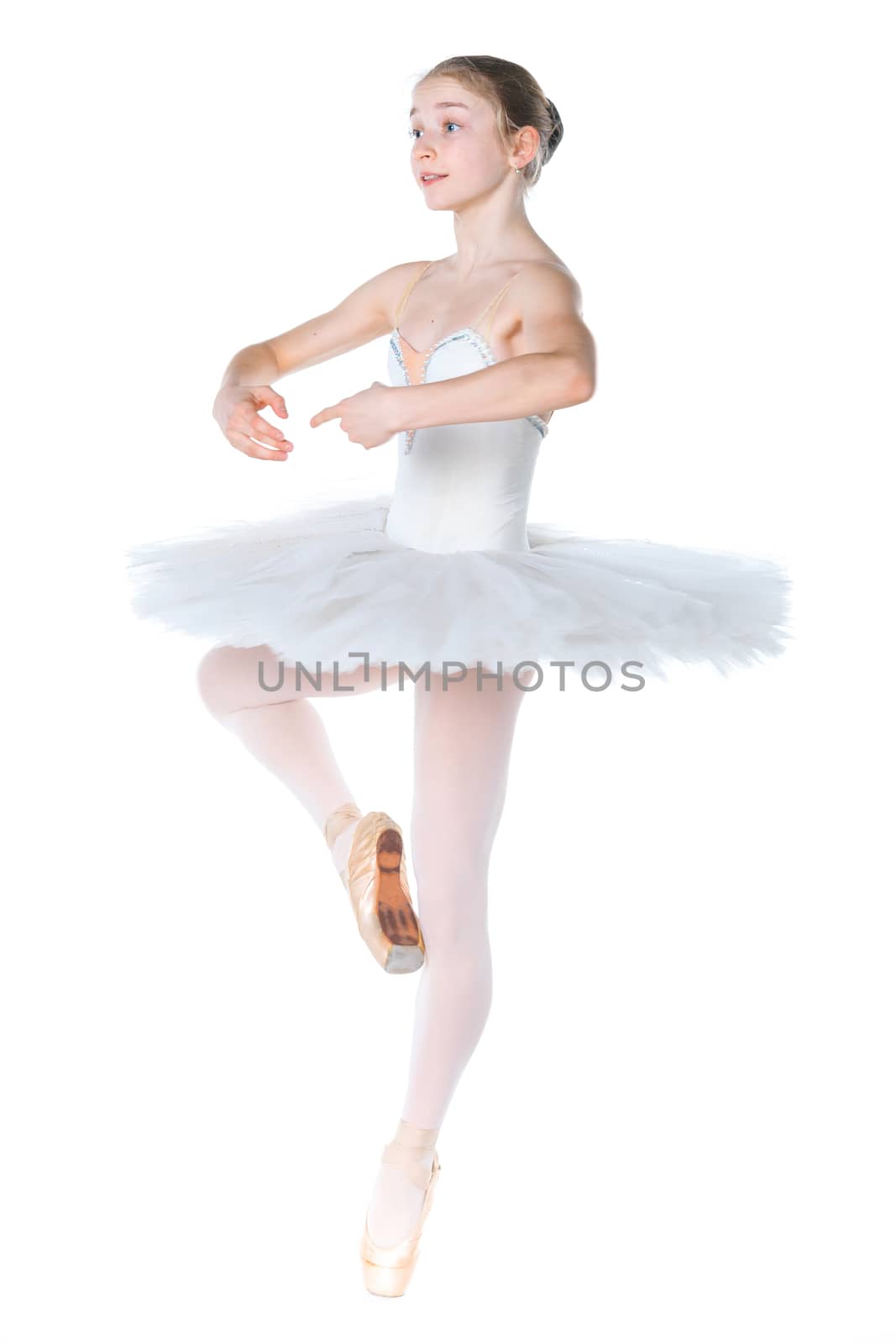 Beautiful young ballerina on a white background