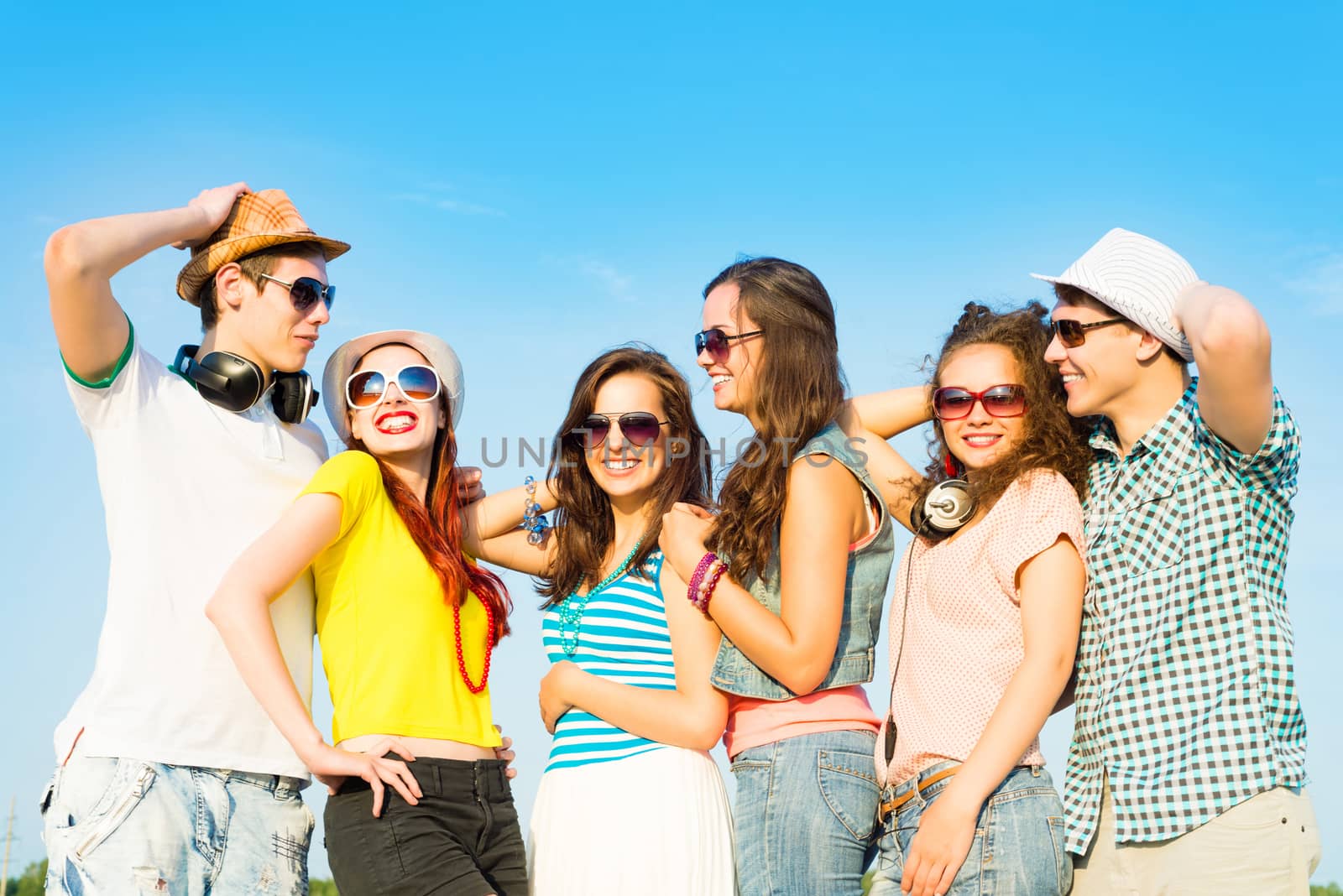 group of young people wearing sunglasses and hat by adam121