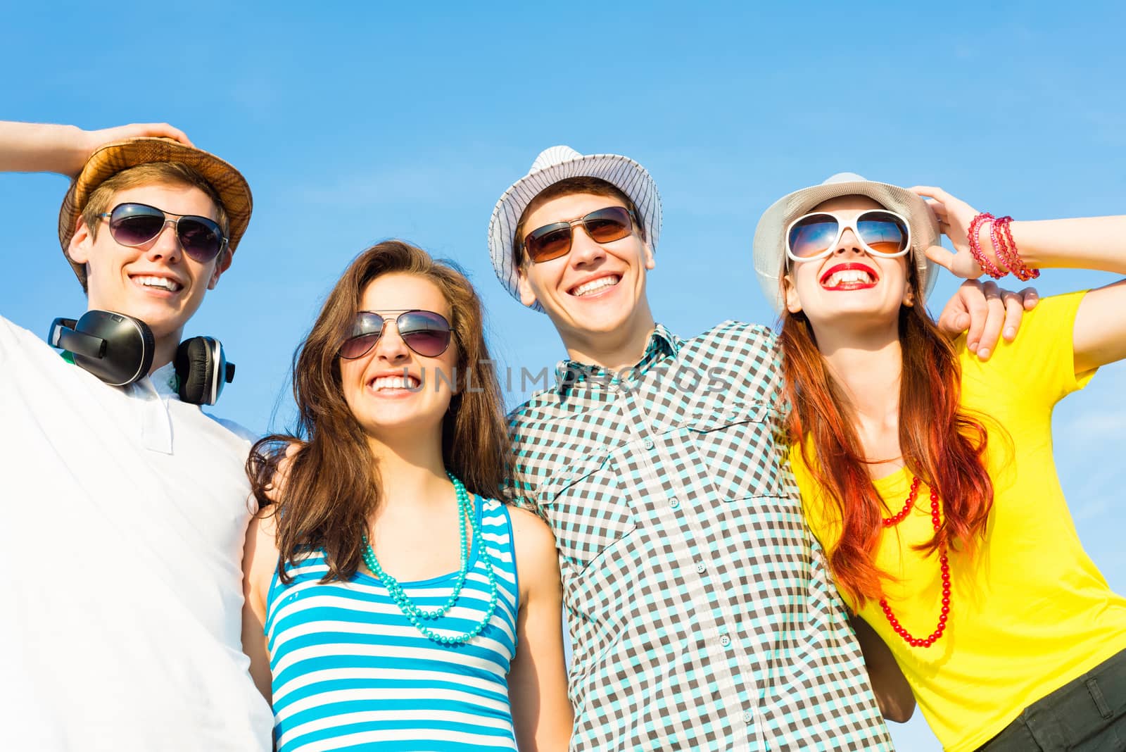 group of young people wearing sunglasses and hat by adam121