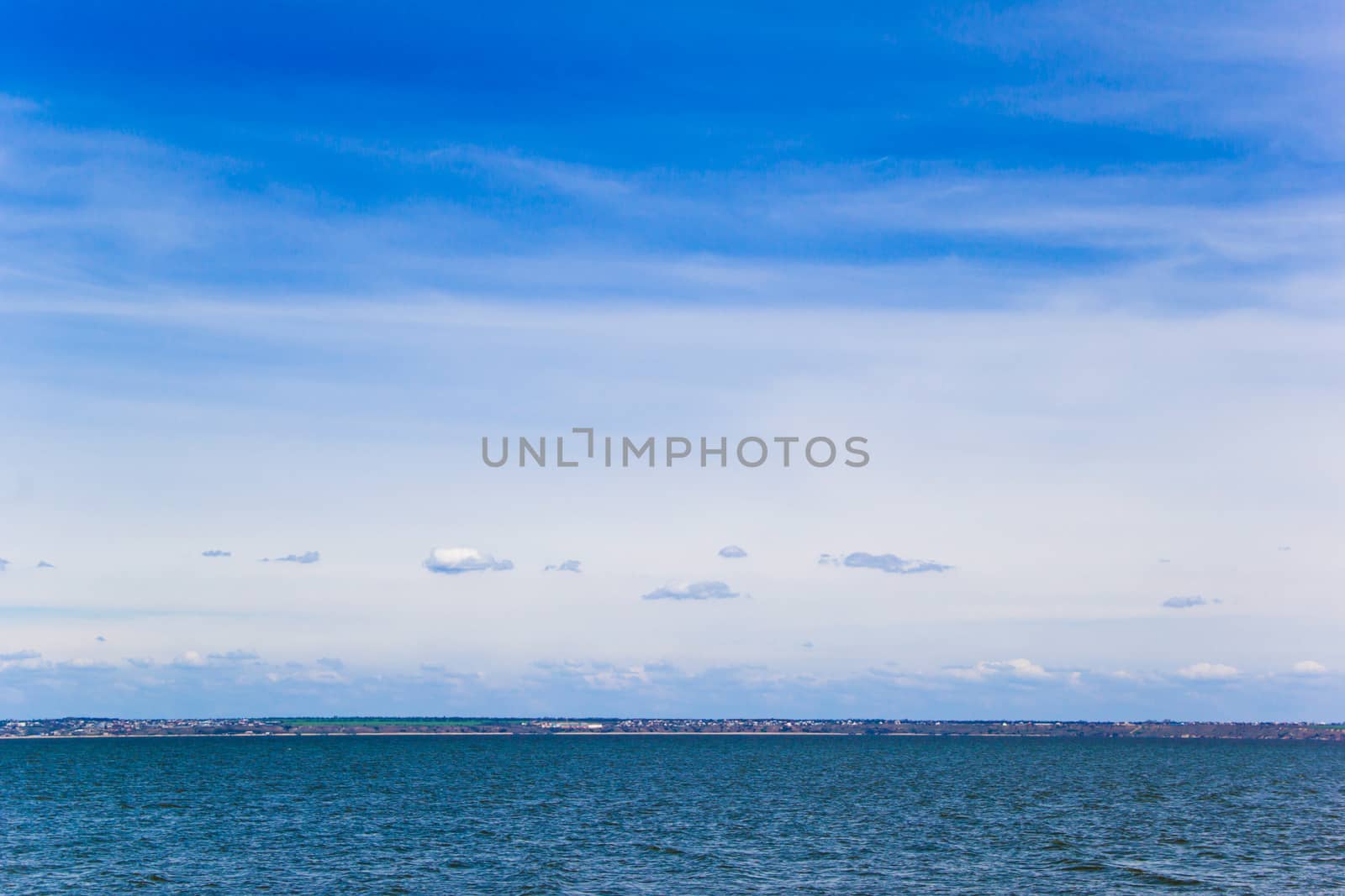 landscape river, sky, clouds and opposite shore