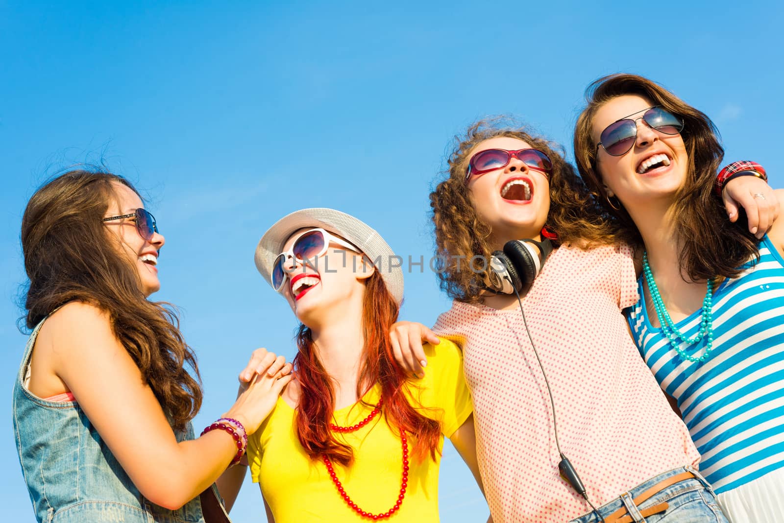 group of young people wearing sunglasses and hat by adam121