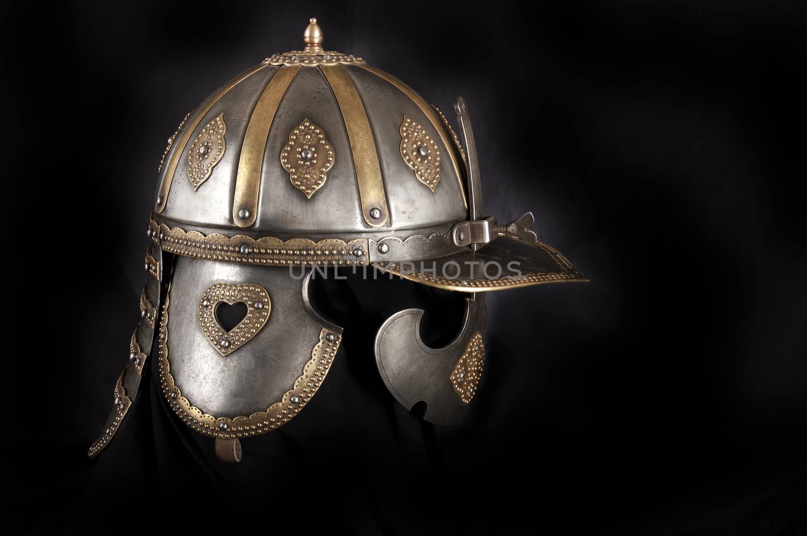 Iron helmet of the medieval knight. Very heavy headdress