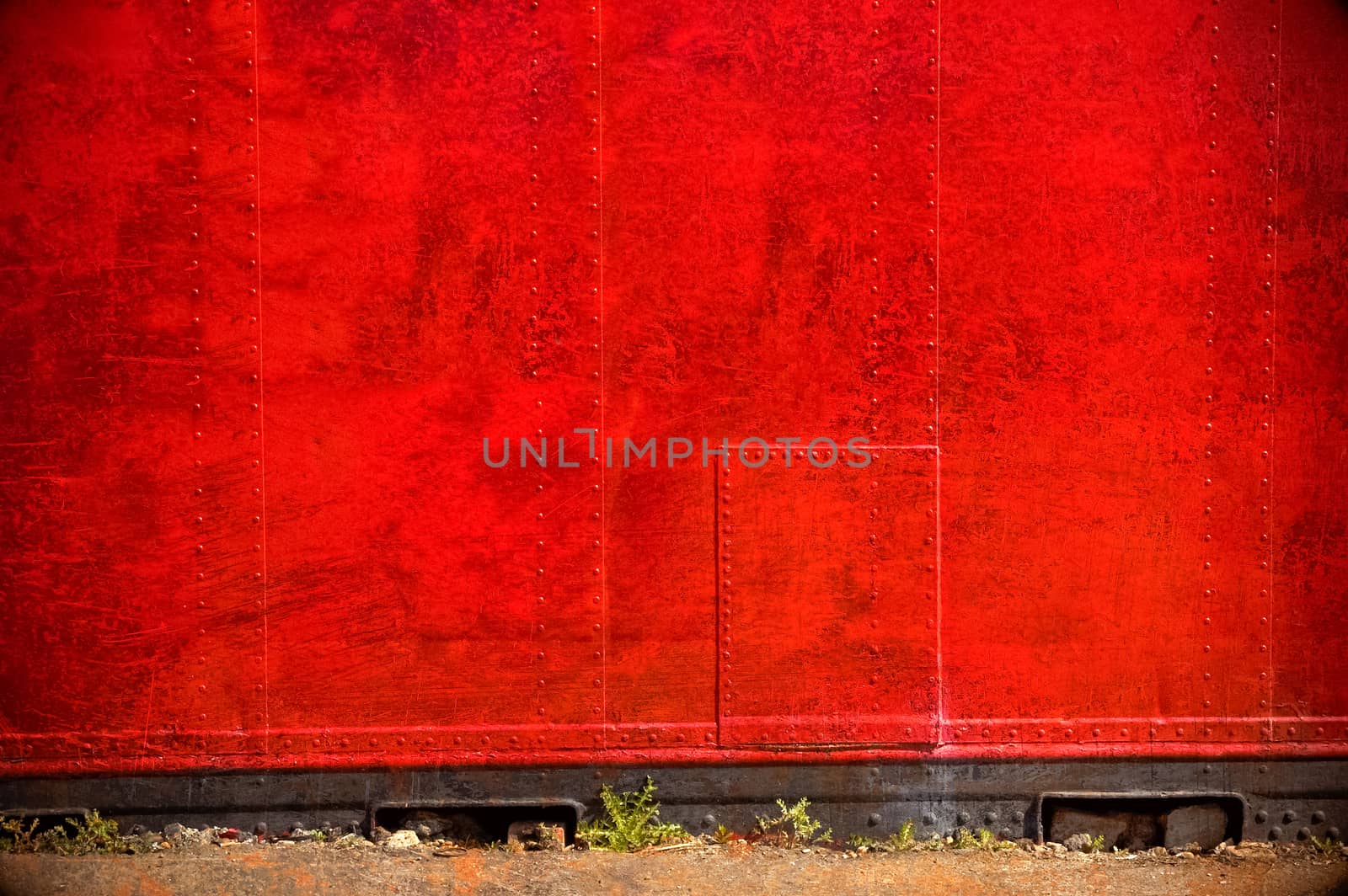 grunge toned red metallic wall