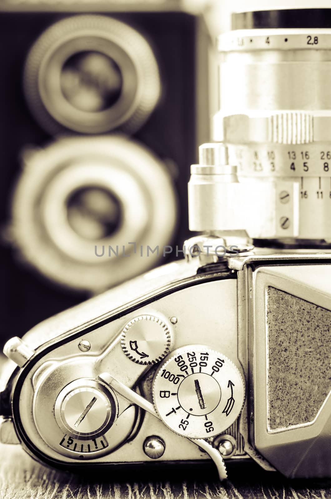 Detail view of classic camera dials with nice bokeh background in vintage style