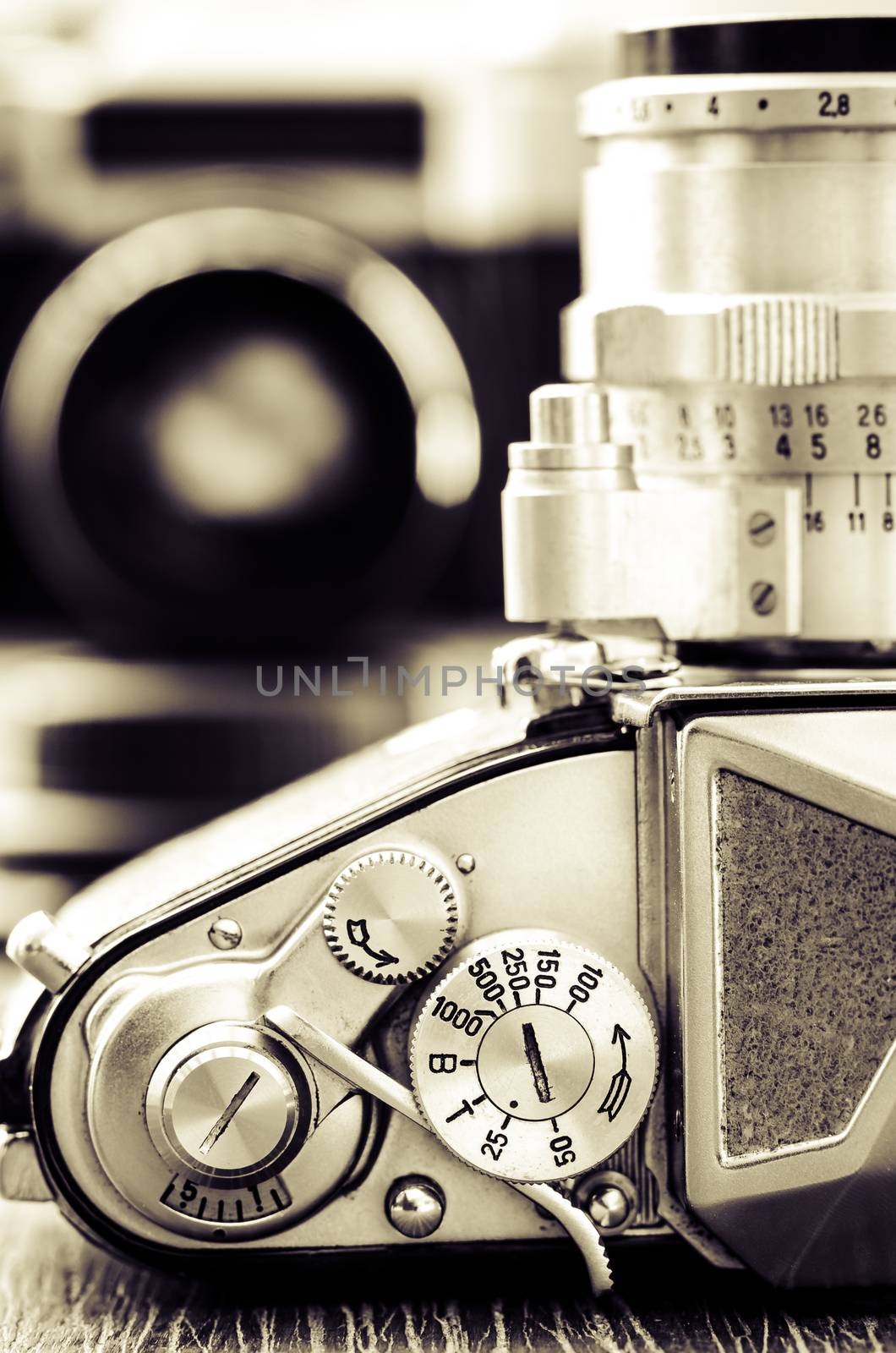 Detail view of classic camera dials with nice bokeh background in vintage style