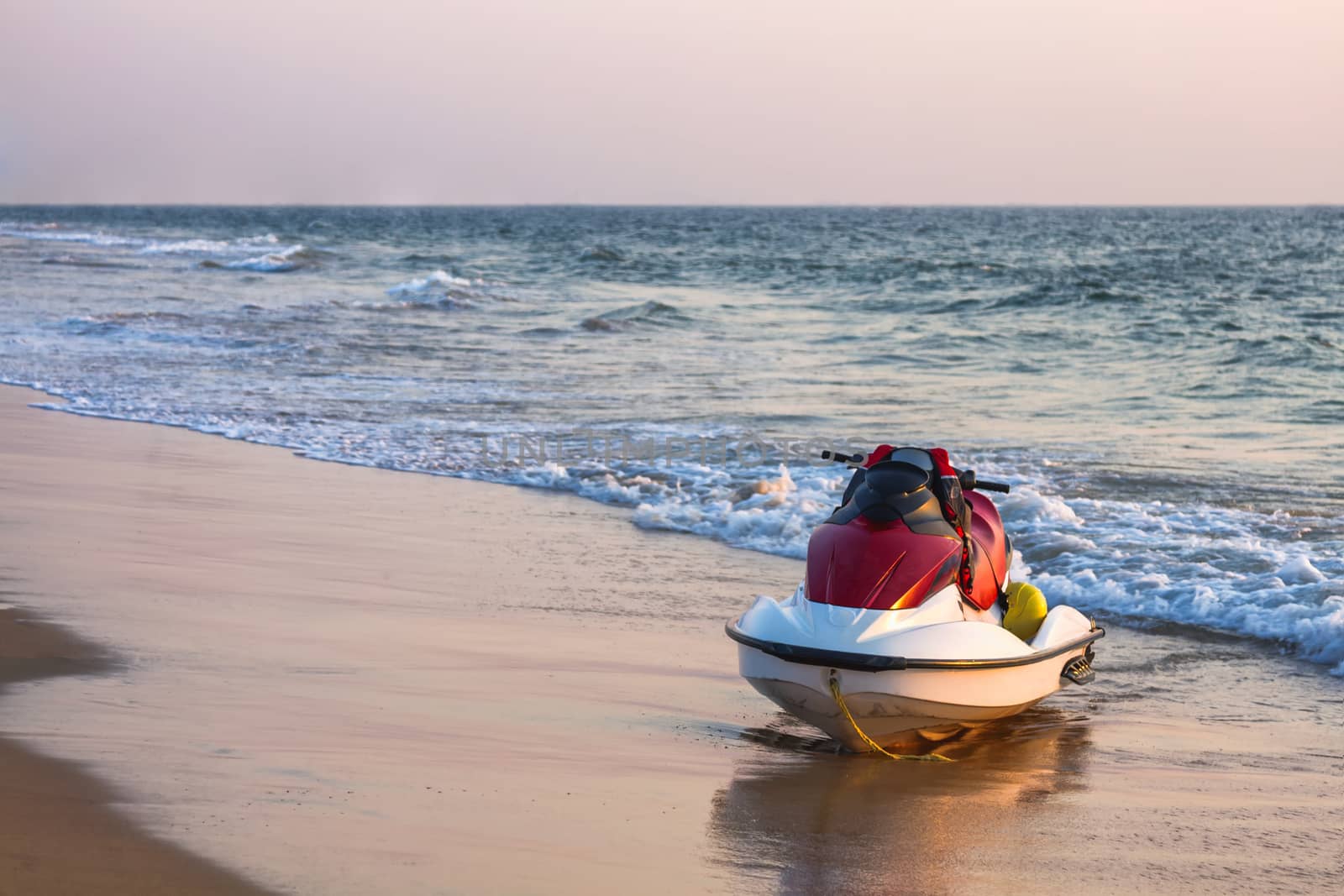 Jet ski on the beach near the ocean